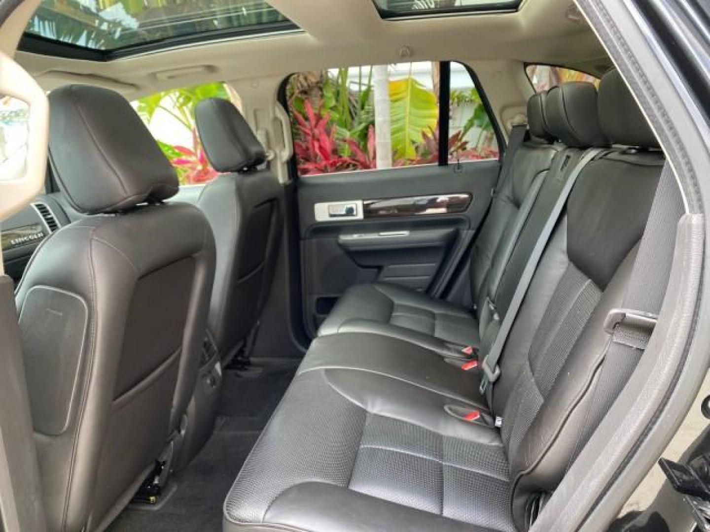 2010 Tuxedo Black Metallic /Charcoal Black Lincoln MKX 1 OWNER LOW MILES 27,203 SUNROOF NAV (2LMDJ6JC7AB) with an 3.5L DOHC 24-Valve V6 Duratec Engine engine, Automatic transmission, located at 4701 North Dixie Hwy, Pompano Beach, FL, 33064, (954) 422-2889, 26.240938, -80.123474 - OUR WEBPAGE FLORIDACARS1.COM HAS OVER 100 PHOTOS AND FREE CARFAX LINK 2010 Lincoln MKX 1 OWNER 4 Door Wagon/Sport Utility 3.5L V6 F DOHC 24V Gasoline 25 MPG Front Wheel Drive Features A/C Seat(s) ABS Brakes Air Conditioning Alloy Wheels AM/FM Stereo Automatic Transmission Auxiliary Audio Input Bluet - Photo#84