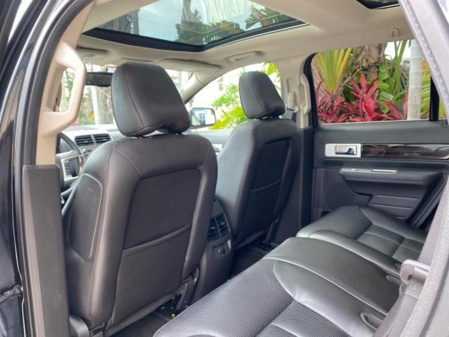 2010 Tuxedo Black Metallic /Charcoal Black Lincoln MKX 1 OWNER LOW MILES 27,203 SUNROOF NAV (2LMDJ6JC7AB) with an 3.5L DOHC 24-Valve V6 Duratec Engine engine, Automatic transmission, located at 4701 North Dixie Hwy, Pompano Beach, FL, 33064, (954) 422-2889, 26.240938, -80.123474 - OUR WEBPAGE FLORIDACARS1.COM HAS OVER 100 PHOTOS AND FREE CARFAX LINK 2010 Lincoln MKX 1 OWNER 4 Door Wagon/Sport Utility 3.5L V6 F DOHC 24V Gasoline 25 MPG Front Wheel Drive Features A/C Seat(s) ABS Brakes Air Conditioning Alloy Wheels AM/FM Stereo Automatic Transmission Auxiliary Audio Input Bluet - Photo#86