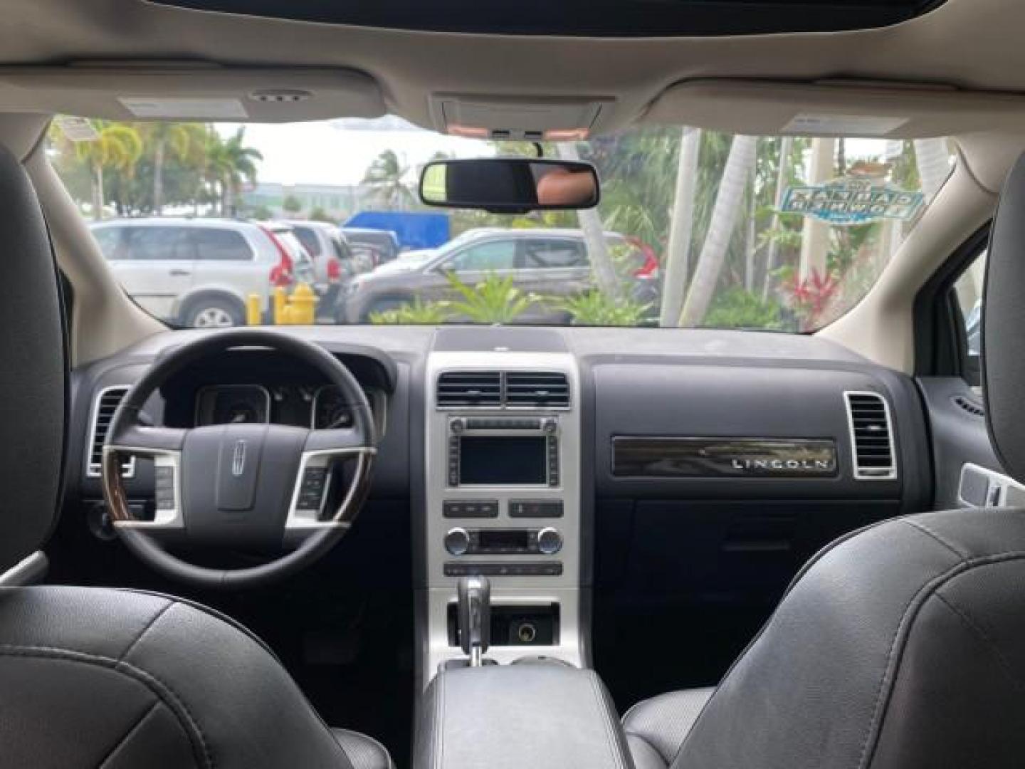 2010 Tuxedo Black Metallic /Charcoal Black Lincoln MKX 1 OWNER LOW MILES 27,203 SUNROOF NAV (2LMDJ6JC7AB) with an 3.5L DOHC 24-Valve V6 Duratec Engine engine, Automatic transmission, located at 4701 North Dixie Hwy, Pompano Beach, FL, 33064, (954) 422-2889, 26.240938, -80.123474 - OUR WEBPAGE FLORIDACARS1.COM HAS OVER 100 PHOTOS AND FREE CARFAX LINK 2010 Lincoln MKX 1 OWNER 4 Door Wagon/Sport Utility 3.5L V6 F DOHC 24V Gasoline 25 MPG Front Wheel Drive Features A/C Seat(s) ABS Brakes Air Conditioning Alloy Wheels AM/FM Stereo Automatic Transmission Auxiliary Audio Input Bluet - Photo#89