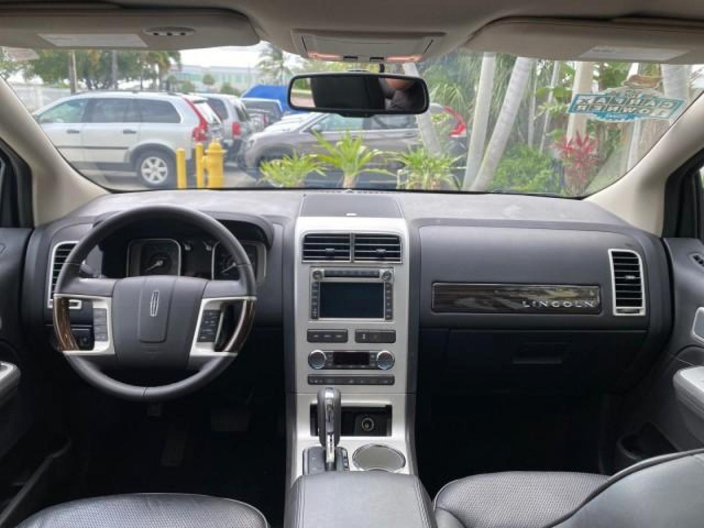 2010 Tuxedo Black Metallic /Charcoal Black Lincoln MKX 1 OWNER LOW MILES 27,203 SUNROOF NAV (2LMDJ6JC7AB) with an 3.5L DOHC 24-Valve V6 Duratec Engine engine, Automatic transmission, located at 4701 North Dixie Hwy, Pompano Beach, FL, 33064, (954) 422-2889, 26.240938, -80.123474 - OUR WEBPAGE FLORIDACARS1.COM HAS OVER 100 PHOTOS AND FREE CARFAX LINK 2010 Lincoln MKX 1 OWNER 4 Door Wagon/Sport Utility 3.5L V6 F DOHC 24V Gasoline 25 MPG Front Wheel Drive Features A/C Seat(s) ABS Brakes Air Conditioning Alloy Wheels AM/FM Stereo Automatic Transmission Auxiliary Audio Input Bluet - Photo#90
