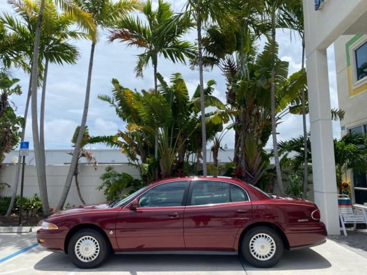 2000 Medium Red Pearl /Taupe Buick LeSabre Limited LEATHER LOW MILES (1G4HR54K1YU) with an 3.8L SFI V6 3800 Series II Engine engine, Automatic transmission, located at 4701 North Dixie Hwy, Pompano Beach, FL, 33064, (954) 422-2889, 26.240938, -80.123474 - OUR WEBPAGE FLORIDACARS1.COM HAS OVER 100 PHOTOS AND FREE CARFAX LINK 2000 Buick Lesabre Limited Sedan 4 DR 3.8L V6 F 12V Gasoline 30 MPG Front Wheel Drive Features ABS Brakes Air Conditioning Alloy Wheels AM/FM Stereo Automatic Transmission Cassette Player CD Audio Cruise Control Leather Seats Powe- Photo#4