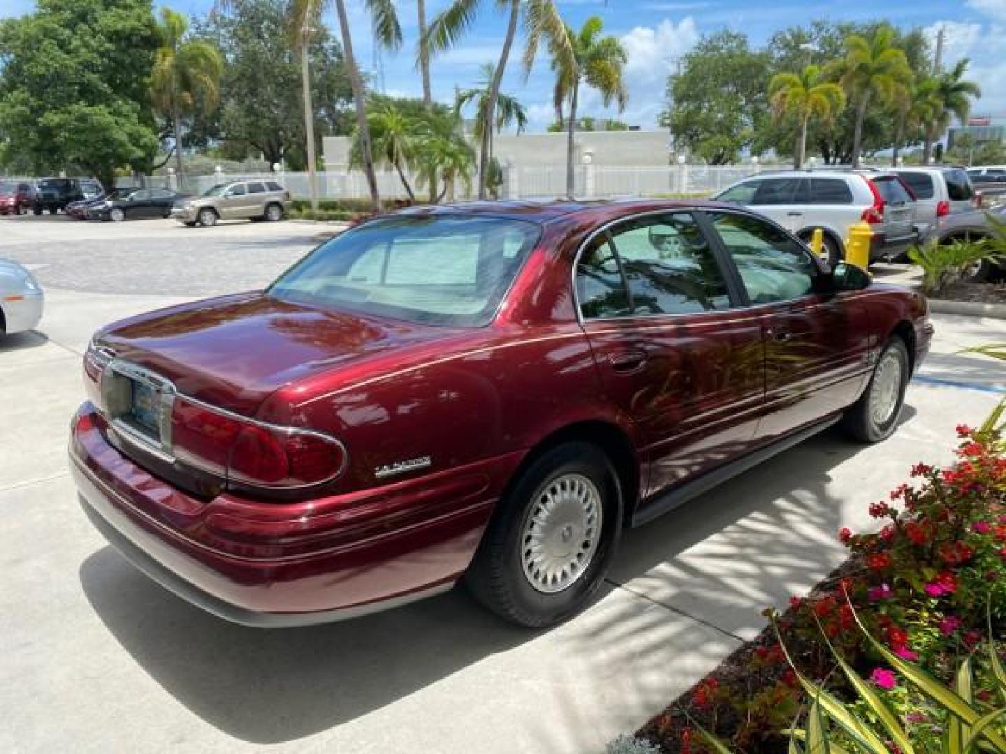 2000 Medium Red Pearl /Taupe Buick LeSabre Limited LEATHER LOW MILES (1G4HR54K1YU) with an 3.8L SFI V6 3800 Series II Engine engine, Automatic transmission, located at 4701 North Dixie Hwy, Pompano Beach, FL, 33064, (954) 422-2889, 26.240938, -80.123474 - OUR WEBPAGE FLORIDACARS1.COM HAS OVER 100 PHOTOS AND FREE CARFAX LINK 2000 Buick Lesabre Limited Sedan 4 DR 3.8L V6 F 12V Gasoline 30 MPG Front Wheel Drive Features ABS Brakes Air Conditioning Alloy Wheels AM/FM Stereo Automatic Transmission Cassette Player CD Audio Cruise Control Leather Seats Powe- Photo#7