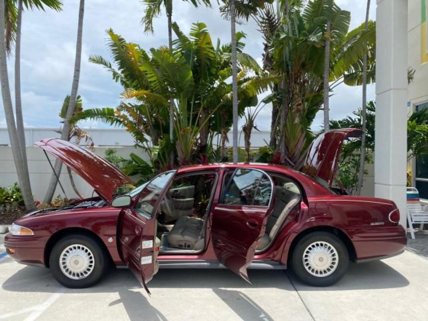 2000 Medium Red Pearl /Taupe Buick LeSabre Limited LEATHER LOW MILES (1G4HR54K1YU) with an 3.8L SFI V6 3800 Series II Engine engine, Automatic transmission, located at 4701 North Dixie Hwy, Pompano Beach, FL, 33064, (954) 422-2889, 26.240938, -80.123474 - OUR WEBPAGE FLORIDACARS1.COM HAS OVER 100 PHOTOS AND FREE CARFAX LINK 2000 Buick Lesabre Limited Sedan 4 DR 3.8L V6 F 12V Gasoline 30 MPG Front Wheel Drive Features ABS Brakes Air Conditioning Alloy Wheels AM/FM Stereo Automatic Transmission Cassette Player CD Audio Cruise Control Leather Seats Powe- Photo#8