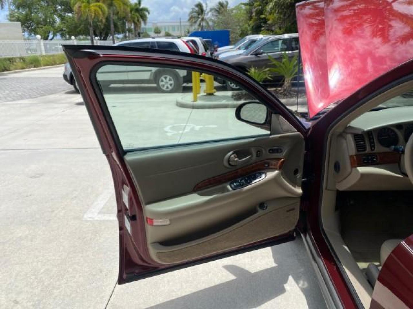 2000 Medium Red Pearl /Taupe Buick LeSabre Limited LEATHER LOW MILES (1G4HR54K1YU) with an 3.8L SFI V6 3800 Series II Engine engine, Automatic transmission, located at 4701 North Dixie Hwy, Pompano Beach, FL, 33064, (954) 422-2889, 26.240938, -80.123474 - OUR WEBPAGE FLORIDACARS1.COM HAS OVER 100 PHOTOS AND FREE CARFAX LINK 2000 Buick Lesabre Limited Sedan 4 DR 3.8L V6 F 12V Gasoline 30 MPG Front Wheel Drive Features ABS Brakes Air Conditioning Alloy Wheels AM/FM Stereo Automatic Transmission Cassette Player CD Audio Cruise Control Leather Seats Powe- Photo#9