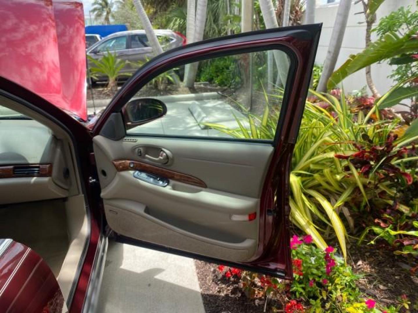 2000 Medium Red Pearl /Taupe Buick LeSabre Limited LEATHER LOW MILES (1G4HR54K1YU) with an 3.8L SFI V6 3800 Series II Engine engine, Automatic transmission, located at 4701 North Dixie Hwy, Pompano Beach, FL, 33064, (954) 422-2889, 26.240938, -80.123474 - OUR WEBPAGE FLORIDACARS1.COM HAS OVER 100 PHOTOS AND FREE CARFAX LINK 2000 Buick Lesabre Limited Sedan 4 DR 3.8L V6 F 12V Gasoline 30 MPG Front Wheel Drive Features ABS Brakes Air Conditioning Alloy Wheels AM/FM Stereo Automatic Transmission Cassette Player CD Audio Cruise Control Leather Seats Powe- Photo#11