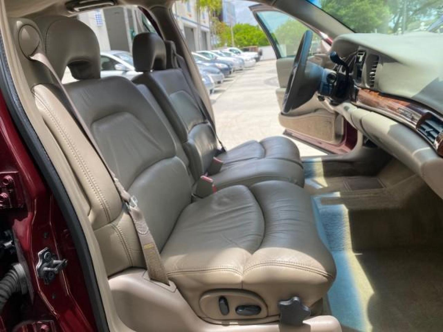 2000 Medium Red Pearl /Taupe Buick LeSabre Limited LEATHER LOW MILES (1G4HR54K1YU) with an 3.8L SFI V6 3800 Series II Engine engine, Automatic transmission, located at 4701 North Dixie Hwy, Pompano Beach, FL, 33064, (954) 422-2889, 26.240938, -80.123474 - OUR WEBPAGE FLORIDACARS1.COM HAS OVER 100 PHOTOS AND FREE CARFAX LINK 2000 Buick Lesabre Limited Sedan 4 DR 3.8L V6 F 12V Gasoline 30 MPG Front Wheel Drive Features ABS Brakes Air Conditioning Alloy Wheels AM/FM Stereo Automatic Transmission Cassette Player CD Audio Cruise Control Leather Seats Powe- Photo#12