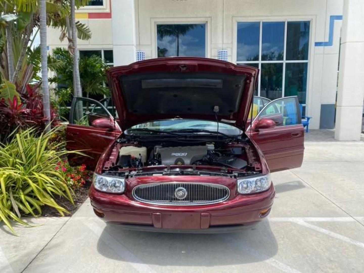 2000 Medium Red Pearl /Taupe Buick LeSabre Limited LEATHER LOW MILES (1G4HR54K1YU) with an 3.8L SFI V6 3800 Series II Engine engine, Automatic transmission, located at 4701 North Dixie Hwy, Pompano Beach, FL, 33064, (954) 422-2889, 26.240938, -80.123474 - OUR WEBPAGE FLORIDACARS1.COM HAS OVER 100 PHOTOS AND FREE CARFAX LINK 2000 Buick Lesabre Limited Sedan 4 DR 3.8L V6 F 12V Gasoline 30 MPG Front Wheel Drive Features ABS Brakes Air Conditioning Alloy Wheels AM/FM Stereo Automatic Transmission Cassette Player CD Audio Cruise Control Leather Seats Powe- Photo#16