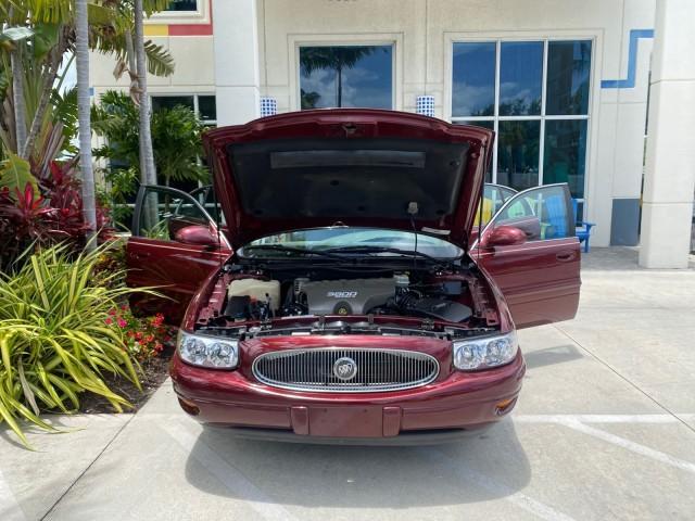2000 Medium Red Pearl /Taupe Buick LeSabre Limited LEATHER LOW MILES (1G4HR54K1YU) with an 3.8L SFI V6 3800 Series II Engine engine, Automatic transmission, located at 4701 North Dixie Hwy, Pompano Beach, FL, 33064, (954) 422-2889, 26.240938, -80.123474 - OUR WEBPAGE FLORIDACARS1.COM HAS OVER 100 PHOTOS AND FREE CARFAX LINK 2000 Buick Lesabre Limited Sedan 4 DR 3.8L V6 F 12V Gasoline 30 MPG Front Wheel Drive Features ABS Brakes Air Conditioning Alloy Wheels AM/FM Stereo Automatic Transmission Cassette Player CD Audio Cruise Control Leather Seats Powe - Photo#16