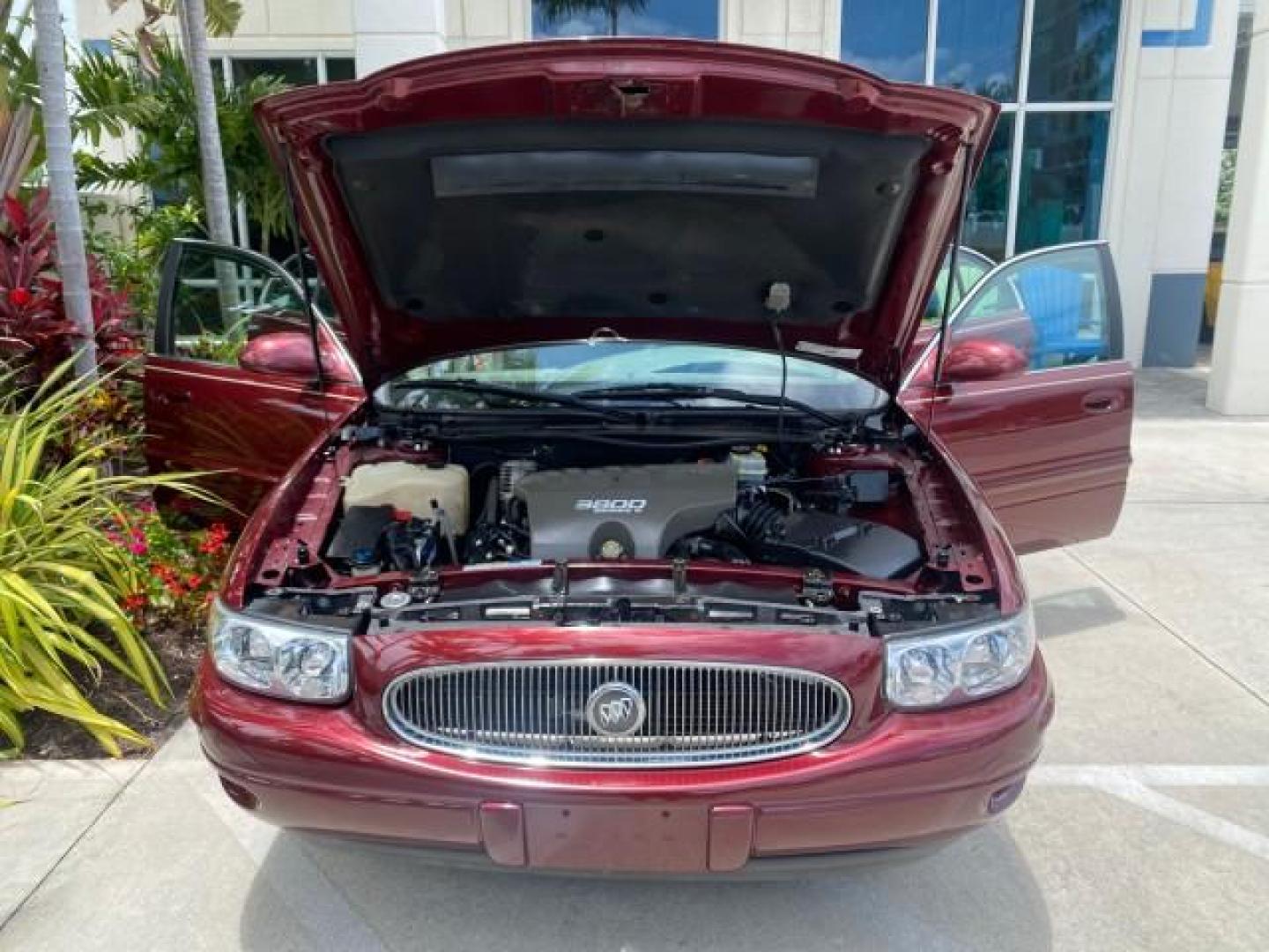 2000 Medium Red Pearl /Taupe Buick LeSabre Limited LEATHER LOW MILES (1G4HR54K1YU) with an 3.8L SFI V6 3800 Series II Engine engine, Automatic transmission, located at 4701 North Dixie Hwy, Pompano Beach, FL, 33064, (954) 422-2889, 26.240938, -80.123474 - OUR WEBPAGE FLORIDACARS1.COM HAS OVER 100 PHOTOS AND FREE CARFAX LINK 2000 Buick Lesabre Limited Sedan 4 DR 3.8L V6 F 12V Gasoline 30 MPG Front Wheel Drive Features ABS Brakes Air Conditioning Alloy Wheels AM/FM Stereo Automatic Transmission Cassette Player CD Audio Cruise Control Leather Seats Powe- Photo#17