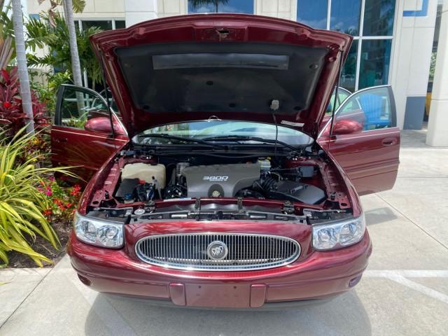 2000 Medium Red Pearl /Taupe Buick LeSabre Limited LEATHER LOW MILES (1G4HR54K1YU) with an 3.8L SFI V6 3800 Series II Engine engine, Automatic transmission, located at 4701 North Dixie Hwy, Pompano Beach, FL, 33064, (954) 422-2889, 26.240938, -80.123474 - OUR WEBPAGE FLORIDACARS1.COM HAS OVER 100 PHOTOS AND FREE CARFAX LINK 2000 Buick Lesabre Limited Sedan 4 DR 3.8L V6 F 12V Gasoline 30 MPG Front Wheel Drive Features ABS Brakes Air Conditioning Alloy Wheels AM/FM Stereo Automatic Transmission Cassette Player CD Audio Cruise Control Leather Seats Powe - Photo#17