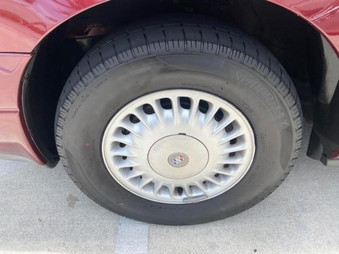 2000 Medium Red Pearl /Taupe Buick LeSabre Limited LEATHER LOW MILES (1G4HR54K1YU) with an 3.8L SFI V6 3800 Series II Engine engine, Automatic transmission, located at 4701 North Dixie Hwy, Pompano Beach, FL, 33064, (954) 422-2889, 26.240938, -80.123474 - OUR WEBPAGE FLORIDACARS1.COM HAS OVER 100 PHOTOS AND FREE CARFAX LINK 2000 Buick Lesabre Limited Sedan 4 DR 3.8L V6 F 12V Gasoline 30 MPG Front Wheel Drive Features ABS Brakes Air Conditioning Alloy Wheels AM/FM Stereo Automatic Transmission Cassette Player CD Audio Cruise Control Leather Seats Powe- Photo#19
