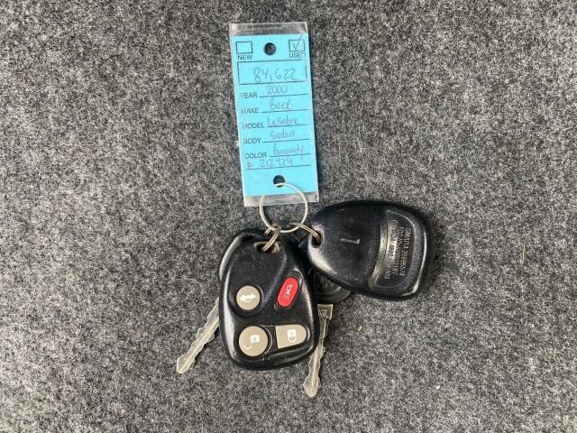 2000 Medium Red Pearl /Taupe Buick LeSabre Limited LEATHER LOW MILES (1G4HR54K1YU) with an 3.8L SFI V6 3800 Series II Engine engine, Automatic transmission, located at 4701 North Dixie Hwy, Pompano Beach, FL, 33064, (954) 422-2889, 26.240938, -80.123474 - OUR WEBPAGE FLORIDACARS1.COM HAS OVER 100 PHOTOS AND FREE CARFAX LINK 2000 Buick Lesabre Limited Sedan 4 DR 3.8L V6 F 12V Gasoline 30 MPG Front Wheel Drive Features ABS Brakes Air Conditioning Alloy Wheels AM/FM Stereo Automatic Transmission Cassette Player CD Audio Cruise Control Leather Seats Powe - Photo#23