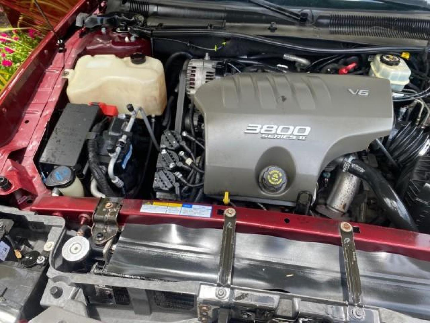 2000 Medium Red Pearl /Taupe Buick LeSabre Limited LEATHER LOW MILES (1G4HR54K1YU) with an 3.8L SFI V6 3800 Series II Engine engine, Automatic transmission, located at 4701 North Dixie Hwy, Pompano Beach, FL, 33064, (954) 422-2889, 26.240938, -80.123474 - OUR WEBPAGE FLORIDACARS1.COM HAS OVER 100 PHOTOS AND FREE CARFAX LINK 2000 Buick Lesabre Limited Sedan 4 DR 3.8L V6 F 12V Gasoline 30 MPG Front Wheel Drive Features ABS Brakes Air Conditioning Alloy Wheels AM/FM Stereo Automatic Transmission Cassette Player CD Audio Cruise Control Leather Seats Powe- Photo#24