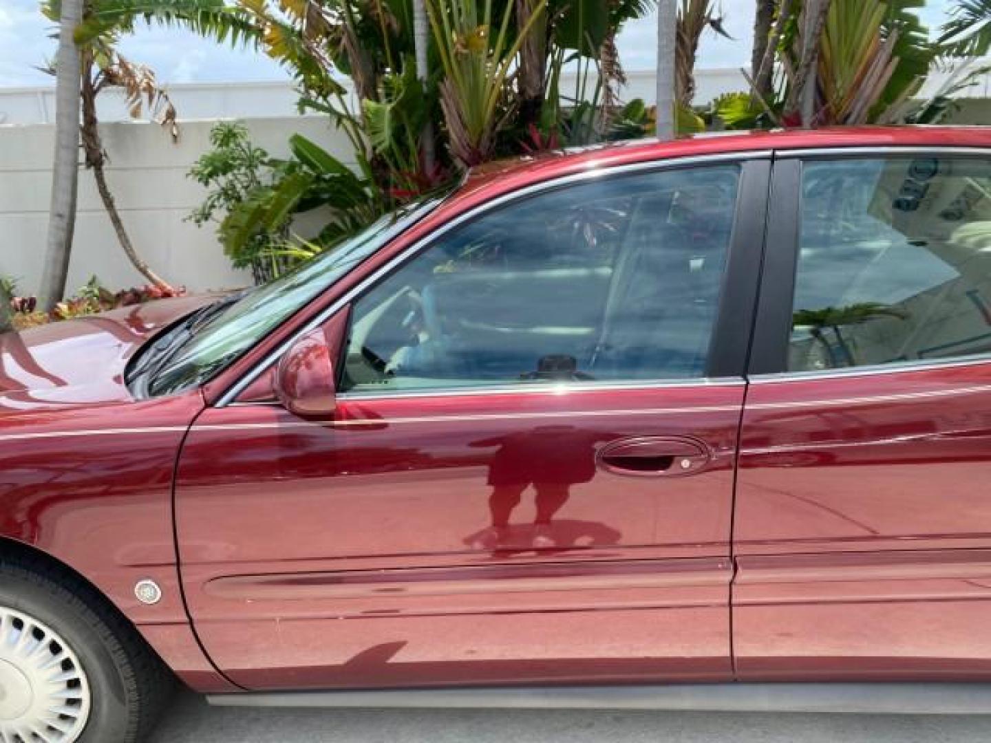 2000 Medium Red Pearl /Taupe Buick LeSabre Limited LEATHER LOW MILES (1G4HR54K1YU) with an 3.8L SFI V6 3800 Series II Engine engine, Automatic transmission, located at 4701 North Dixie Hwy, Pompano Beach, FL, 33064, (954) 422-2889, 26.240938, -80.123474 - OUR WEBPAGE FLORIDACARS1.COM HAS OVER 100 PHOTOS AND FREE CARFAX LINK 2000 Buick Lesabre Limited Sedan 4 DR 3.8L V6 F 12V Gasoline 30 MPG Front Wheel Drive Features ABS Brakes Air Conditioning Alloy Wheels AM/FM Stereo Automatic Transmission Cassette Player CD Audio Cruise Control Leather Seats Powe- Photo#37
