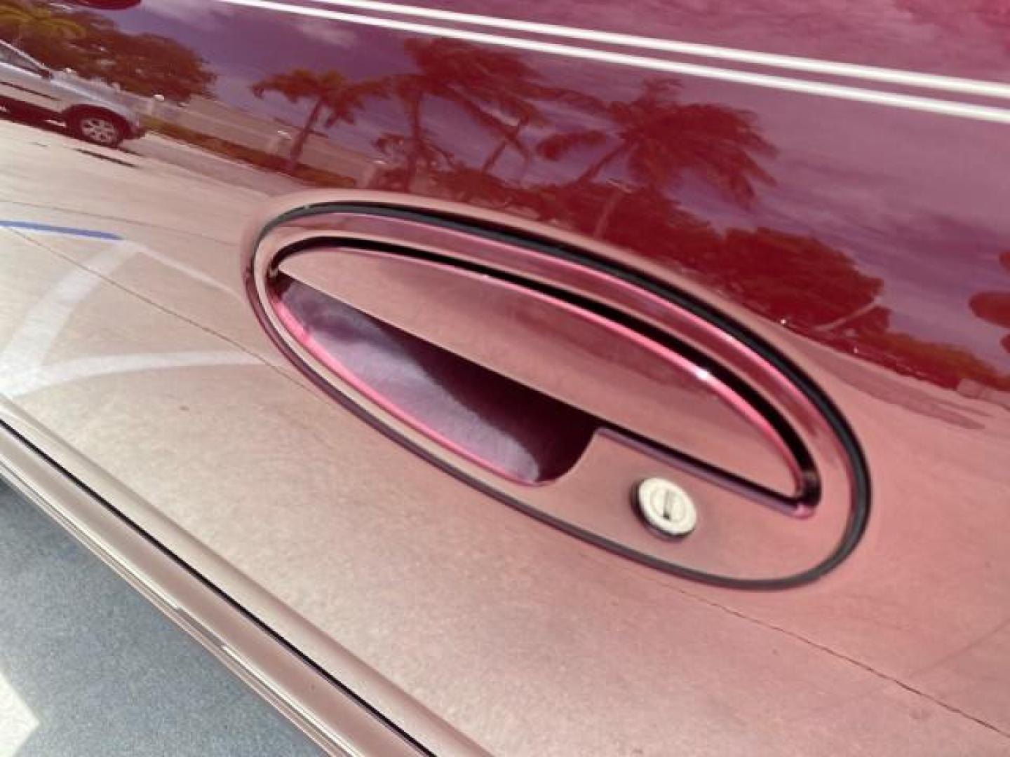 2000 Medium Red Pearl /Taupe Buick LeSabre Limited LEATHER LOW MILES (1G4HR54K1YU) with an 3.8L SFI V6 3800 Series II Engine engine, Automatic transmission, located at 4701 North Dixie Hwy, Pompano Beach, FL, 33064, (954) 422-2889, 26.240938, -80.123474 - OUR WEBPAGE FLORIDACARS1.COM HAS OVER 100 PHOTOS AND FREE CARFAX LINK 2000 Buick Lesabre Limited Sedan 4 DR 3.8L V6 F 12V Gasoline 30 MPG Front Wheel Drive Features ABS Brakes Air Conditioning Alloy Wheels AM/FM Stereo Automatic Transmission Cassette Player CD Audio Cruise Control Leather Seats Powe- Photo#38