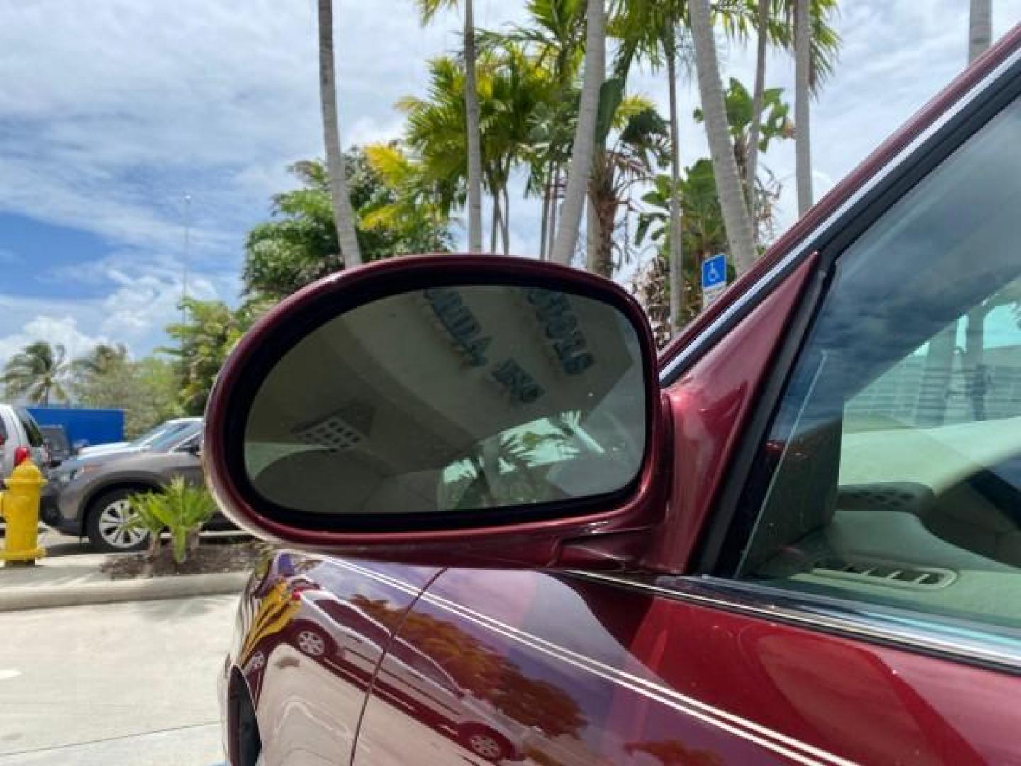 2000 Medium Red Pearl /Taupe Buick LeSabre Limited LEATHER LOW MILES (1G4HR54K1YU) with an 3.8L SFI V6 3800 Series II Engine engine, Automatic transmission, located at 4701 North Dixie Hwy, Pompano Beach, FL, 33064, (954) 422-2889, 26.240938, -80.123474 - OUR WEBPAGE FLORIDACARS1.COM HAS OVER 100 PHOTOS AND FREE CARFAX LINK 2000 Buick Lesabre Limited Sedan 4 DR 3.8L V6 F 12V Gasoline 30 MPG Front Wheel Drive Features ABS Brakes Air Conditioning Alloy Wheels AM/FM Stereo Automatic Transmission Cassette Player CD Audio Cruise Control Leather Seats Powe- Photo#39