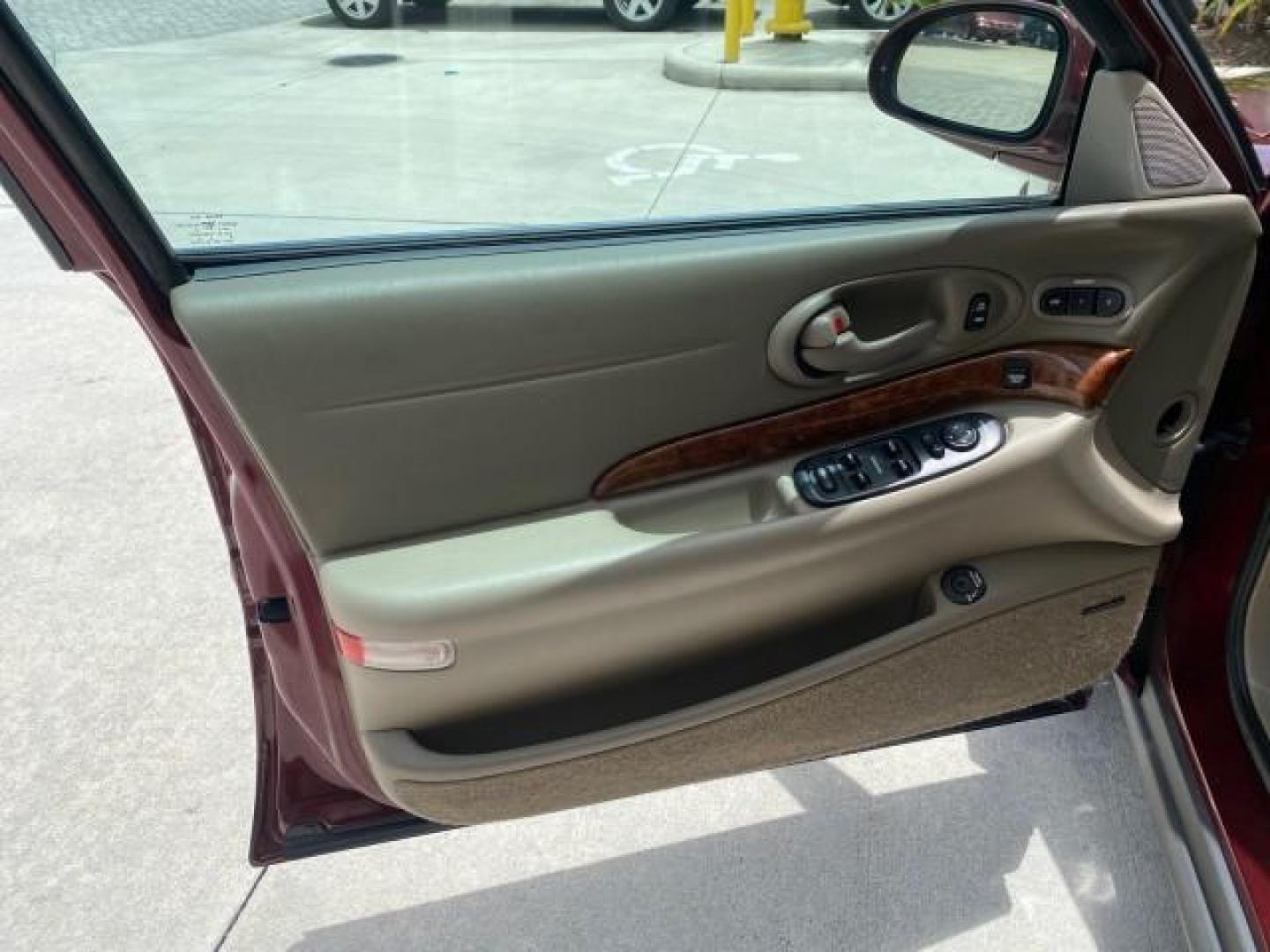 2000 Medium Red Pearl /Taupe Buick LeSabre Limited LEATHER LOW MILES (1G4HR54K1YU) with an 3.8L SFI V6 3800 Series II Engine engine, Automatic transmission, located at 4701 North Dixie Hwy, Pompano Beach, FL, 33064, (954) 422-2889, 26.240938, -80.123474 - OUR WEBPAGE FLORIDACARS1.COM HAS OVER 100 PHOTOS AND FREE CARFAX LINK 2000 Buick Lesabre Limited Sedan 4 DR 3.8L V6 F 12V Gasoline 30 MPG Front Wheel Drive Features ABS Brakes Air Conditioning Alloy Wheels AM/FM Stereo Automatic Transmission Cassette Player CD Audio Cruise Control Leather Seats Powe- Photo#41