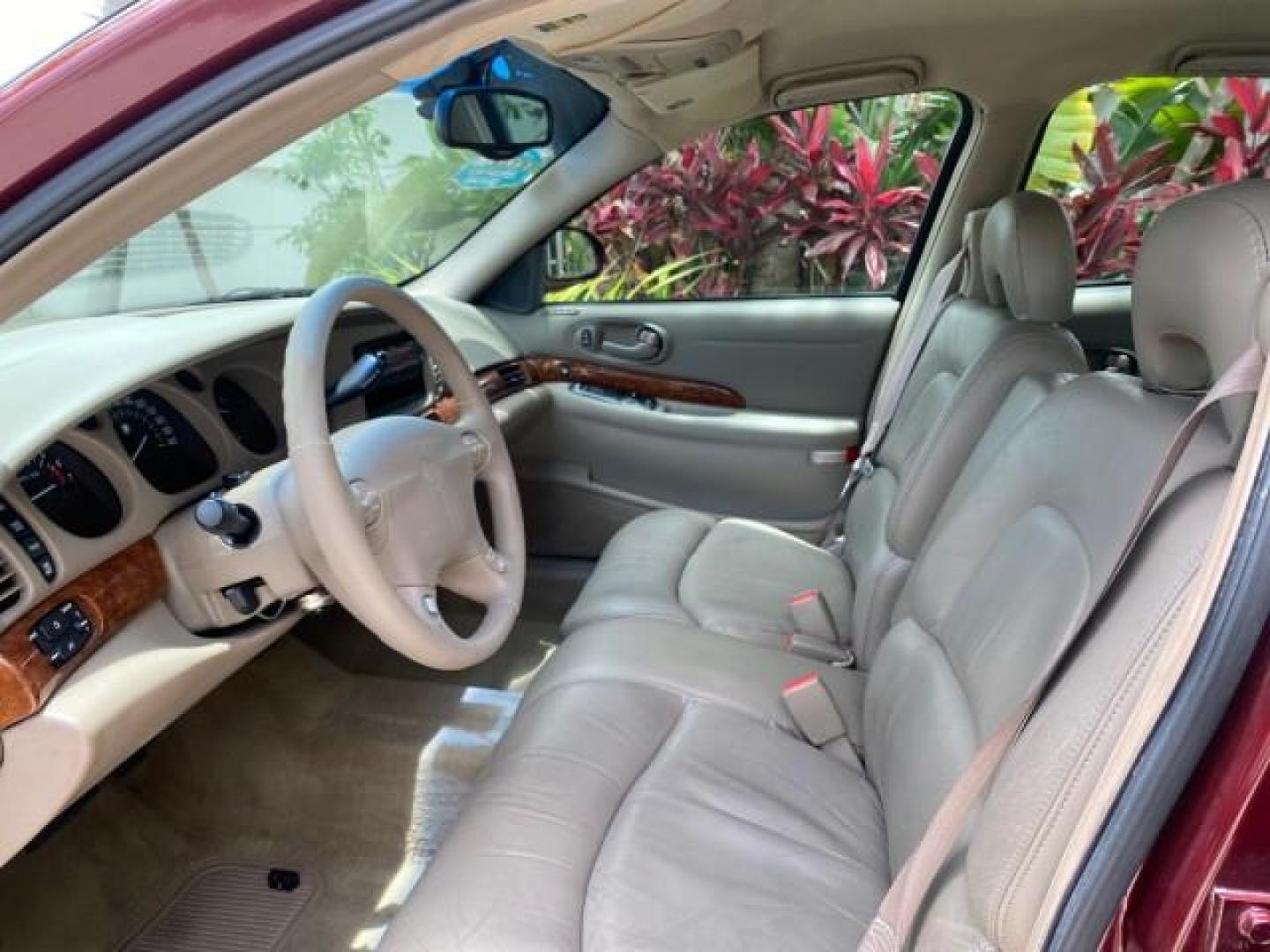 2000 Medium Red Pearl /Taupe Buick LeSabre Limited LEATHER LOW MILES (1G4HR54K1YU) with an 3.8L SFI V6 3800 Series II Engine engine, Automatic transmission, located at 4701 North Dixie Hwy, Pompano Beach, FL, 33064, (954) 422-2889, 26.240938, -80.123474 - OUR WEBPAGE FLORIDACARS1.COM HAS OVER 100 PHOTOS AND FREE CARFAX LINK 2000 Buick Lesabre Limited Sedan 4 DR 3.8L V6 F 12V Gasoline 30 MPG Front Wheel Drive Features ABS Brakes Air Conditioning Alloy Wheels AM/FM Stereo Automatic Transmission Cassette Player CD Audio Cruise Control Leather Seats Powe- Photo#44
