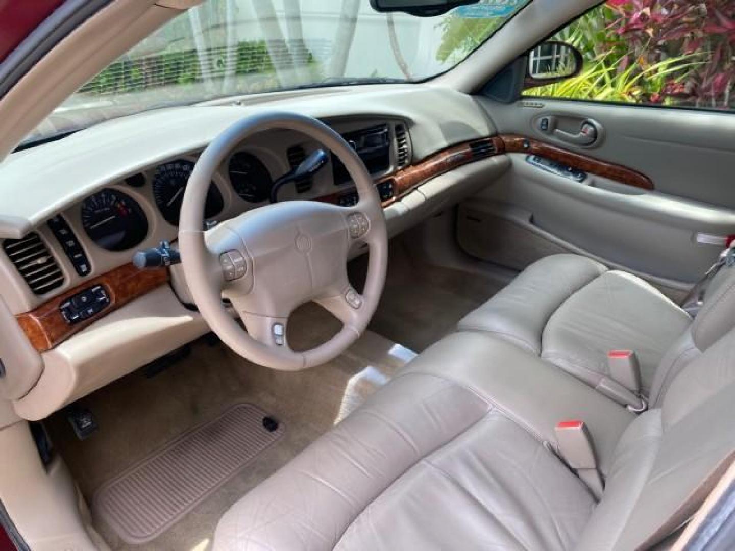 2000 Medium Red Pearl /Taupe Buick LeSabre Limited LEATHER LOW MILES (1G4HR54K1YU) with an 3.8L SFI V6 3800 Series II Engine engine, Automatic transmission, located at 4701 North Dixie Hwy, Pompano Beach, FL, 33064, (954) 422-2889, 26.240938, -80.123474 - OUR WEBPAGE FLORIDACARS1.COM HAS OVER 100 PHOTOS AND FREE CARFAX LINK 2000 Buick Lesabre Limited Sedan 4 DR 3.8L V6 F 12V Gasoline 30 MPG Front Wheel Drive Features ABS Brakes Air Conditioning Alloy Wheels AM/FM Stereo Automatic Transmission Cassette Player CD Audio Cruise Control Leather Seats Powe- Photo#46