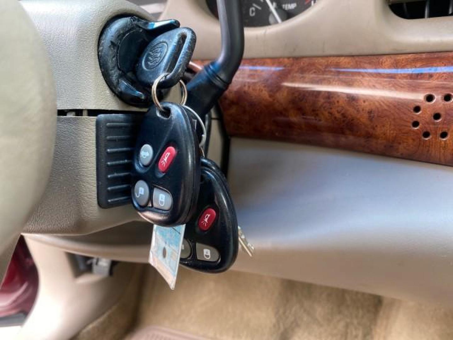 2000 Medium Red Pearl /Taupe Buick LeSabre Limited LEATHER LOW MILES (1G4HR54K1YU) with an 3.8L SFI V6 3800 Series II Engine engine, Automatic transmission, located at 4701 North Dixie Hwy, Pompano Beach, FL, 33064, (954) 422-2889, 26.240938, -80.123474 - OUR WEBPAGE FLORIDACARS1.COM HAS OVER 100 PHOTOS AND FREE CARFAX LINK 2000 Buick Lesabre Limited Sedan 4 DR 3.8L V6 F 12V Gasoline 30 MPG Front Wheel Drive Features ABS Brakes Air Conditioning Alloy Wheels AM/FM Stereo Automatic Transmission Cassette Player CD Audio Cruise Control Leather Seats Powe- Photo#58