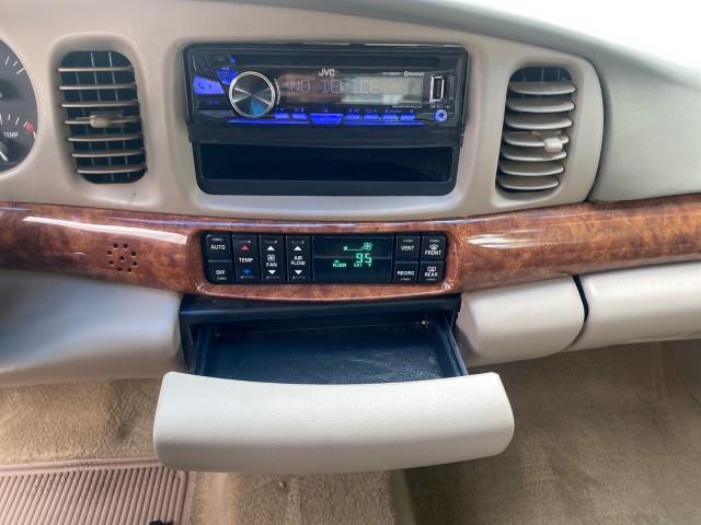 2000 Medium Red Pearl /Taupe Buick LeSabre Limited LEATHER LOW MILES (1G4HR54K1YU) with an 3.8L SFI V6 3800 Series II Engine engine, Automatic transmission, located at 4701 North Dixie Hwy, Pompano Beach, FL, 33064, (954) 422-2889, 26.240938, -80.123474 - OUR WEBPAGE FLORIDACARS1.COM HAS OVER 100 PHOTOS AND FREE CARFAX LINK 2000 Buick Lesabre Limited Sedan 4 DR 3.8L V6 F 12V Gasoline 30 MPG Front Wheel Drive Features ABS Brakes Air Conditioning Alloy Wheels AM/FM Stereo Automatic Transmission Cassette Player CD Audio Cruise Control Leather Seats Powe - Photo#62