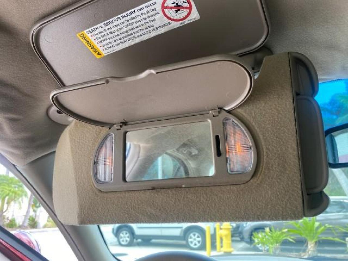 2000 Medium Red Pearl /Taupe Buick LeSabre Limited LEATHER LOW MILES (1G4HR54K1YU) with an 3.8L SFI V6 3800 Series II Engine engine, Automatic transmission, located at 4701 North Dixie Hwy, Pompano Beach, FL, 33064, (954) 422-2889, 26.240938, -80.123474 - OUR WEBPAGE FLORIDACARS1.COM HAS OVER 100 PHOTOS AND FREE CARFAX LINK 2000 Buick Lesabre Limited Sedan 4 DR 3.8L V6 F 12V Gasoline 30 MPG Front Wheel Drive Features ABS Brakes Air Conditioning Alloy Wheels AM/FM Stereo Automatic Transmission Cassette Player CD Audio Cruise Control Leather Seats Powe- Photo#66
