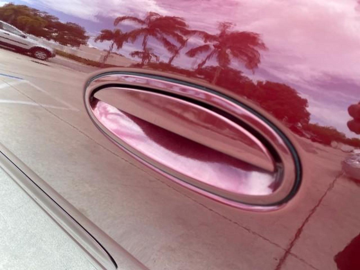 2000 Medium Red Pearl /Taupe Buick LeSabre Limited LEATHER LOW MILES (1G4HR54K1YU) with an 3.8L SFI V6 3800 Series II Engine engine, Automatic transmission, located at 4701 North Dixie Hwy, Pompano Beach, FL, 33064, (954) 422-2889, 26.240938, -80.123474 - OUR WEBPAGE FLORIDACARS1.COM HAS OVER 100 PHOTOS AND FREE CARFAX LINK 2000 Buick Lesabre Limited Sedan 4 DR 3.8L V6 F 12V Gasoline 30 MPG Front Wheel Drive Features ABS Brakes Air Conditioning Alloy Wheels AM/FM Stereo Automatic Transmission Cassette Player CD Audio Cruise Control Leather Seats Powe- Photo#72