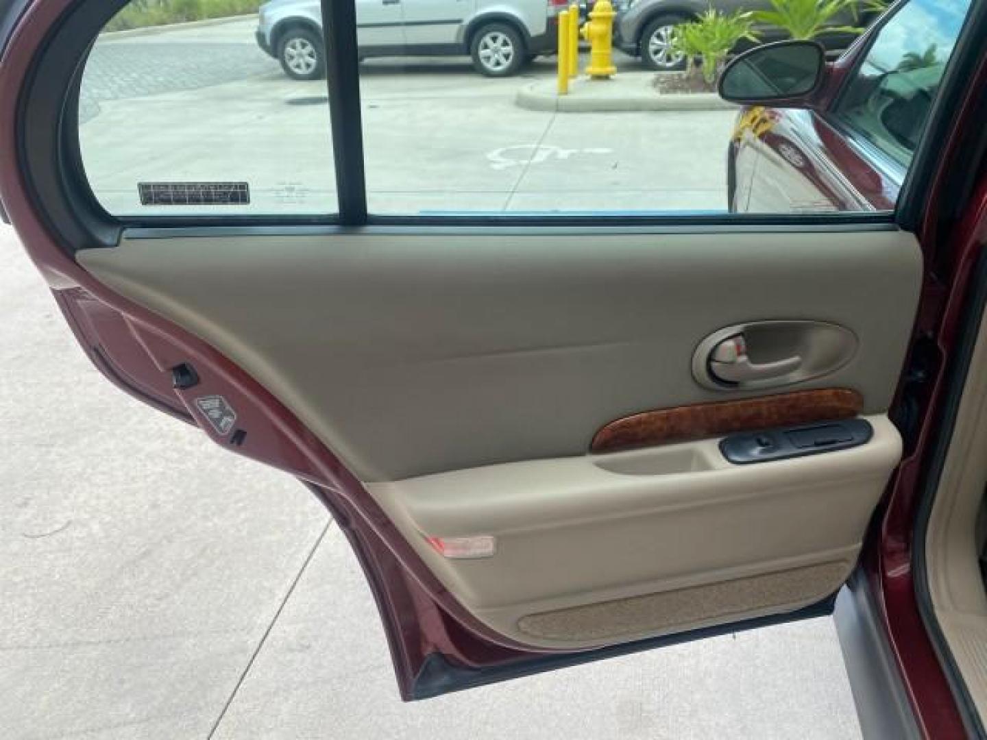 2000 Medium Red Pearl /Taupe Buick LeSabre Limited LEATHER LOW MILES (1G4HR54K1YU) with an 3.8L SFI V6 3800 Series II Engine engine, Automatic transmission, located at 4701 North Dixie Hwy, Pompano Beach, FL, 33064, (954) 422-2889, 26.240938, -80.123474 - OUR WEBPAGE FLORIDACARS1.COM HAS OVER 100 PHOTOS AND FREE CARFAX LINK 2000 Buick Lesabre Limited Sedan 4 DR 3.8L V6 F 12V Gasoline 30 MPG Front Wheel Drive Features ABS Brakes Air Conditioning Alloy Wheels AM/FM Stereo Automatic Transmission Cassette Player CD Audio Cruise Control Leather Seats Powe- Photo#73