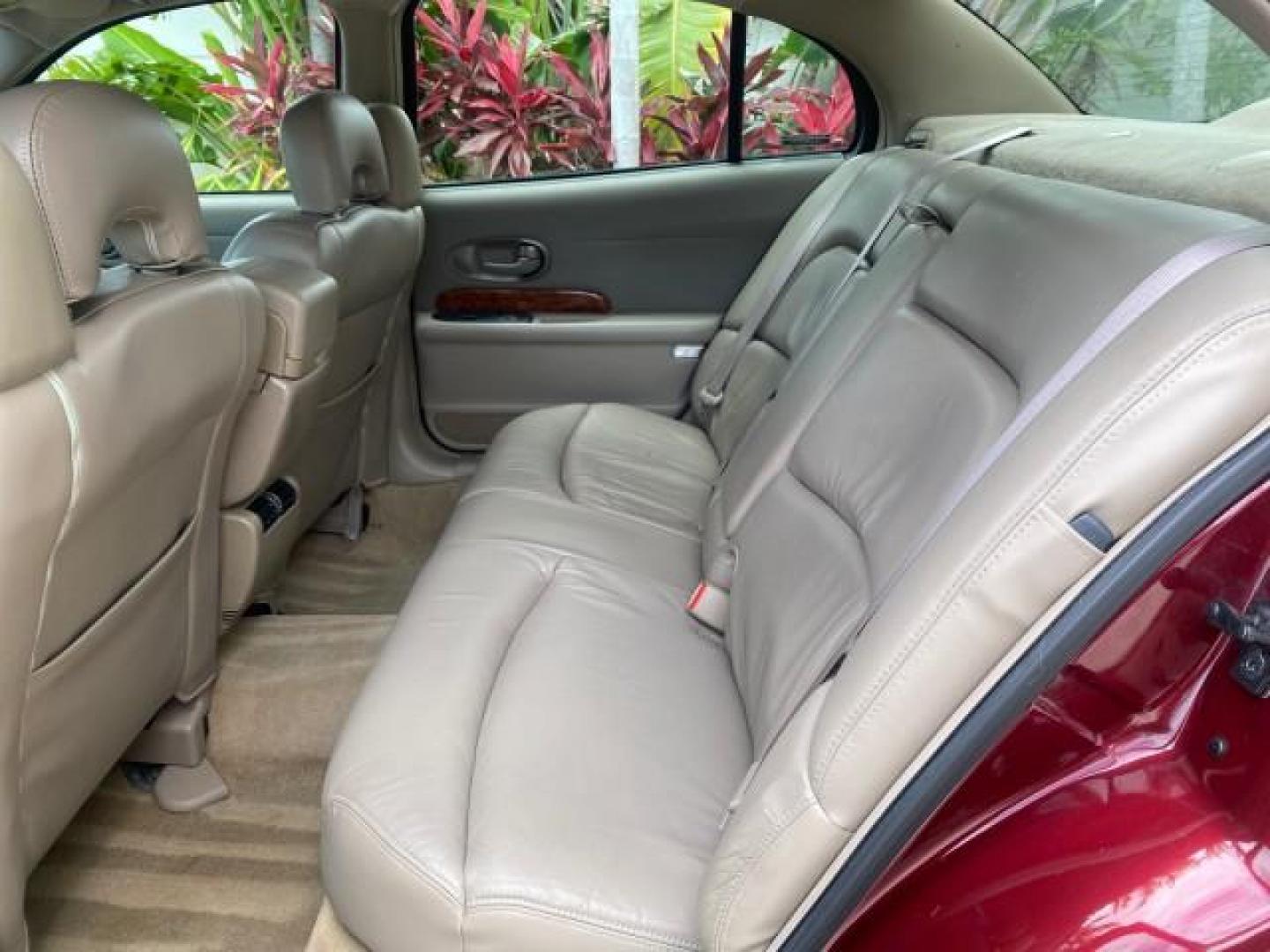 2000 Medium Red Pearl /Taupe Buick LeSabre Limited LEATHER LOW MILES (1G4HR54K1YU) with an 3.8L SFI V6 3800 Series II Engine engine, Automatic transmission, located at 4701 North Dixie Hwy, Pompano Beach, FL, 33064, (954) 422-2889, 26.240938, -80.123474 - OUR WEBPAGE FLORIDACARS1.COM HAS OVER 100 PHOTOS AND FREE CARFAX LINK 2000 Buick Lesabre Limited Sedan 4 DR 3.8L V6 F 12V Gasoline 30 MPG Front Wheel Drive Features ABS Brakes Air Conditioning Alloy Wheels AM/FM Stereo Automatic Transmission Cassette Player CD Audio Cruise Control Leather Seats Powe- Photo#75