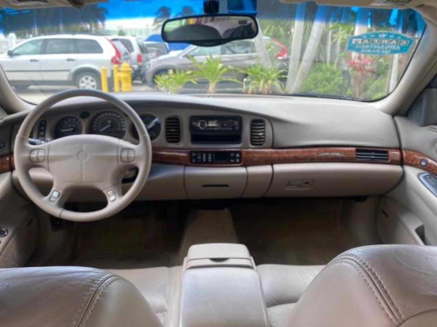 2000 Medium Red Pearl /Taupe Buick LeSabre Limited LEATHER LOW MILES (1G4HR54K1YU) with an 3.8L SFI V6 3800 Series II Engine engine, Automatic transmission, located at 4701 North Dixie Hwy, Pompano Beach, FL, 33064, (954) 422-2889, 26.240938, -80.123474 - OUR WEBPAGE FLORIDACARS1.COM HAS OVER 100 PHOTOS AND FREE CARFAX LINK 2000 Buick Lesabre Limited Sedan 4 DR 3.8L V6 F 12V Gasoline 30 MPG Front Wheel Drive Features ABS Brakes Air Conditioning Alloy Wheels AM/FM Stereo Automatic Transmission Cassette Player CD Audio Cruise Control Leather Seats Powe- Photo#80