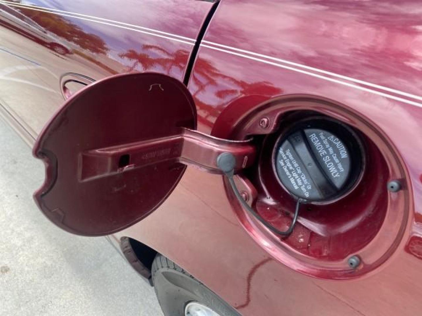 2000 Medium Red Pearl /Taupe Buick LeSabre Limited LEATHER LOW MILES (1G4HR54K1YU) with an 3.8L SFI V6 3800 Series II Engine engine, Automatic transmission, located at 4701 North Dixie Hwy, Pompano Beach, FL, 33064, (954) 422-2889, 26.240938, -80.123474 - OUR WEBPAGE FLORIDACARS1.COM HAS OVER 100 PHOTOS AND FREE CARFAX LINK 2000 Buick Lesabre Limited Sedan 4 DR 3.8L V6 F 12V Gasoline 30 MPG Front Wheel Drive Features ABS Brakes Air Conditioning Alloy Wheels AM/FM Stereo Automatic Transmission Cassette Player CD Audio Cruise Control Leather Seats Powe- Photo#87