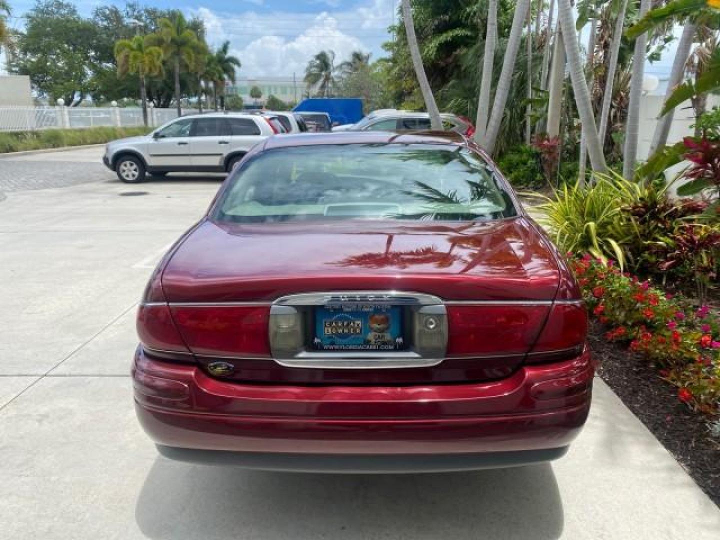 2000 Medium Red Pearl /Taupe Buick LeSabre Limited LEATHER LOW MILES (1G4HR54K1YU) with an 3.8L SFI V6 3800 Series II Engine engine, Automatic transmission, located at 4701 North Dixie Hwy, Pompano Beach, FL, 33064, (954) 422-2889, 26.240938, -80.123474 - OUR WEBPAGE FLORIDACARS1.COM HAS OVER 100 PHOTOS AND FREE CARFAX LINK 2000 Buick Lesabre Limited Sedan 4 DR 3.8L V6 F 12V Gasoline 30 MPG Front Wheel Drive Features ABS Brakes Air Conditioning Alloy Wheels AM/FM Stereo Automatic Transmission Cassette Player CD Audio Cruise Control Leather Seats Powe- Photo#89