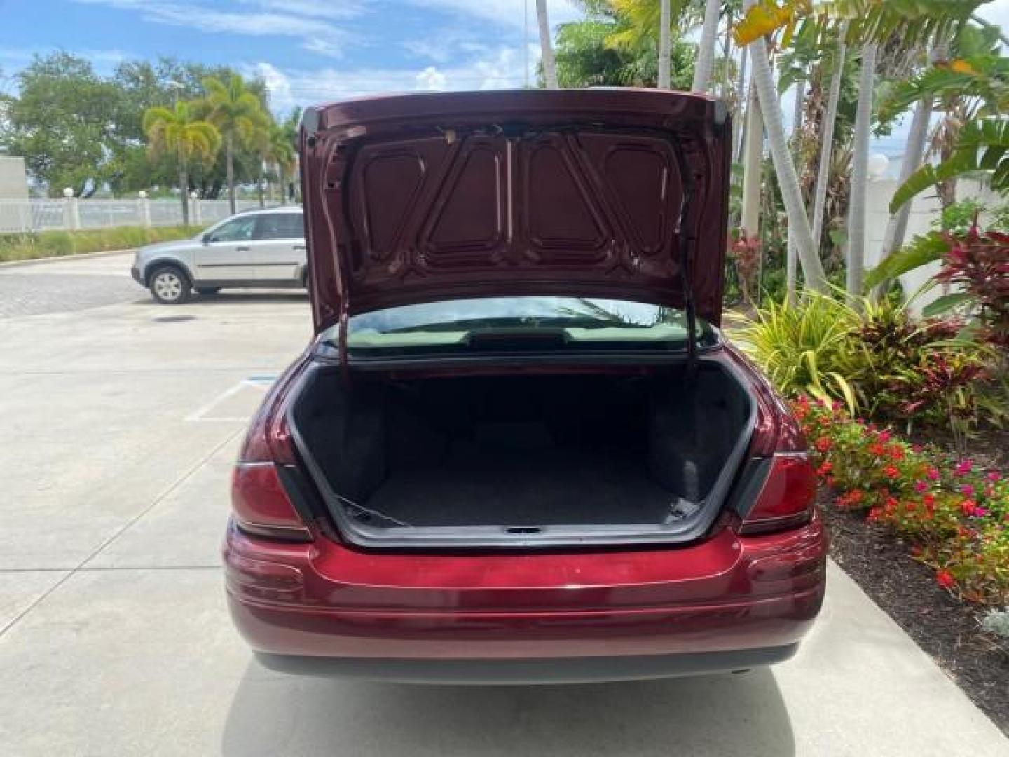 2000 Medium Red Pearl /Taupe Buick LeSabre Limited LEATHER LOW MILES (1G4HR54K1YU) with an 3.8L SFI V6 3800 Series II Engine engine, Automatic transmission, located at 4701 North Dixie Hwy, Pompano Beach, FL, 33064, (954) 422-2889, 26.240938, -80.123474 - OUR WEBPAGE FLORIDACARS1.COM HAS OVER 100 PHOTOS AND FREE CARFAX LINK 2000 Buick Lesabre Limited Sedan 4 DR 3.8L V6 F 12V Gasoline 30 MPG Front Wheel Drive Features ABS Brakes Air Conditioning Alloy Wheels AM/FM Stereo Automatic Transmission Cassette Player CD Audio Cruise Control Leather Seats Powe- Photo#94