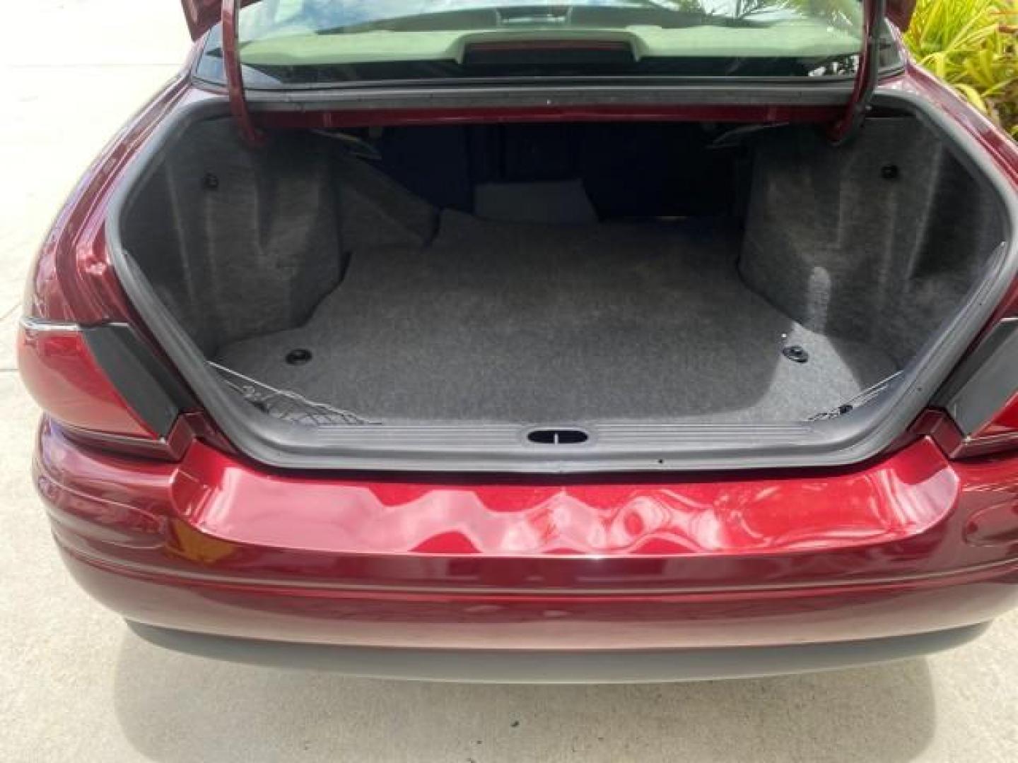 2000 Medium Red Pearl /Taupe Buick LeSabre Limited LEATHER LOW MILES (1G4HR54K1YU) with an 3.8L SFI V6 3800 Series II Engine engine, Automatic transmission, located at 4701 North Dixie Hwy, Pompano Beach, FL, 33064, (954) 422-2889, 26.240938, -80.123474 - OUR WEBPAGE FLORIDACARS1.COM HAS OVER 100 PHOTOS AND FREE CARFAX LINK 2000 Buick Lesabre Limited Sedan 4 DR 3.8L V6 F 12V Gasoline 30 MPG Front Wheel Drive Features ABS Brakes Air Conditioning Alloy Wheels AM/FM Stereo Automatic Transmission Cassette Player CD Audio Cruise Control Leather Seats Powe- Photo#95