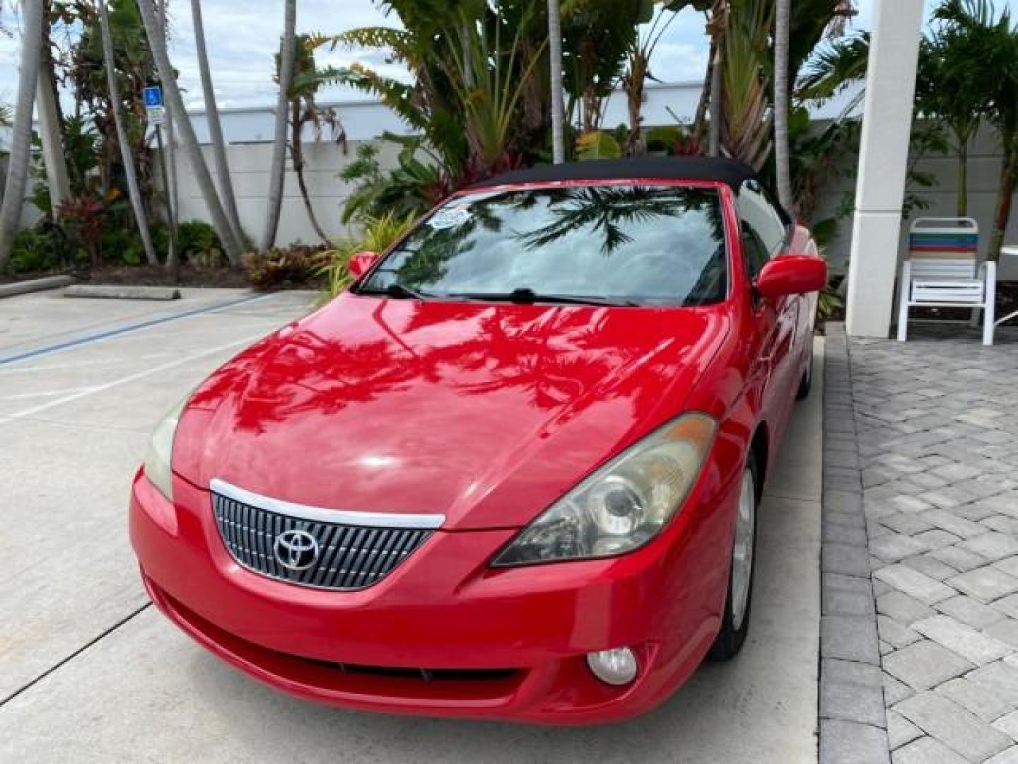 2004 Absolutely Red /Dark Stone Toyota Camry Solara CONV SE 1 OWNER 74972 Mi (4T1FA38P64U) with an 3.3L DOHC SMPI VVT-i 24-Valve V6 Engine engine, Automatic transmission, located at 4701 North Dixie Hwy, Pompano Beach, FL, 33064, (954) 422-2889, 26.240938, -80.123474 - OUR WEBPAGE FLORIDACARS1.COM HAS OVER 100 PHOTOS AND FREE CARFAX LINK 2004 Toyota Camry Solara SE V6 Convertible 3.3L V6 F DOHC 24V Gasoline 29 MPG Front Wheel Drive Features ABS Brakes Air Conditioning Alloy Wheels AM/FM Stereo Automatic Transmission Cassette Player CD Audio Cloth Seats Cruise Cont- Photo#3
