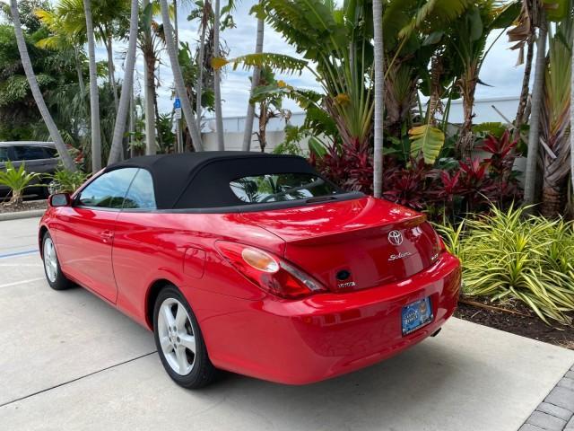 2004 Absolutely Red /Dark Stone Toyota Camry Solara CONV SE 1 OWNER 74972 Mi (4T1FA38P64U) with an 3.3L DOHC SMPI VVT-i 24-Valve V6 Engine engine, Automatic transmission, located at 4701 North Dixie Hwy, Pompano Beach, FL, 33064, (954) 422-2889, 26.240938, -80.123474 - OUR WEBPAGE FLORIDACARS1.COM HAS OVER 100 PHOTOS AND FREE CARFAX LINK 2004 Toyota Camry Solara SE V6 Convertible 3.3L V6 F DOHC 24V Gasoline 29 MPG Front Wheel Drive Features ABS Brakes Air Conditioning Alloy Wheels AM/FM Stereo Automatic Transmission Cassette Player CD Audio Cloth Seats Cruise Cont - Photo#5