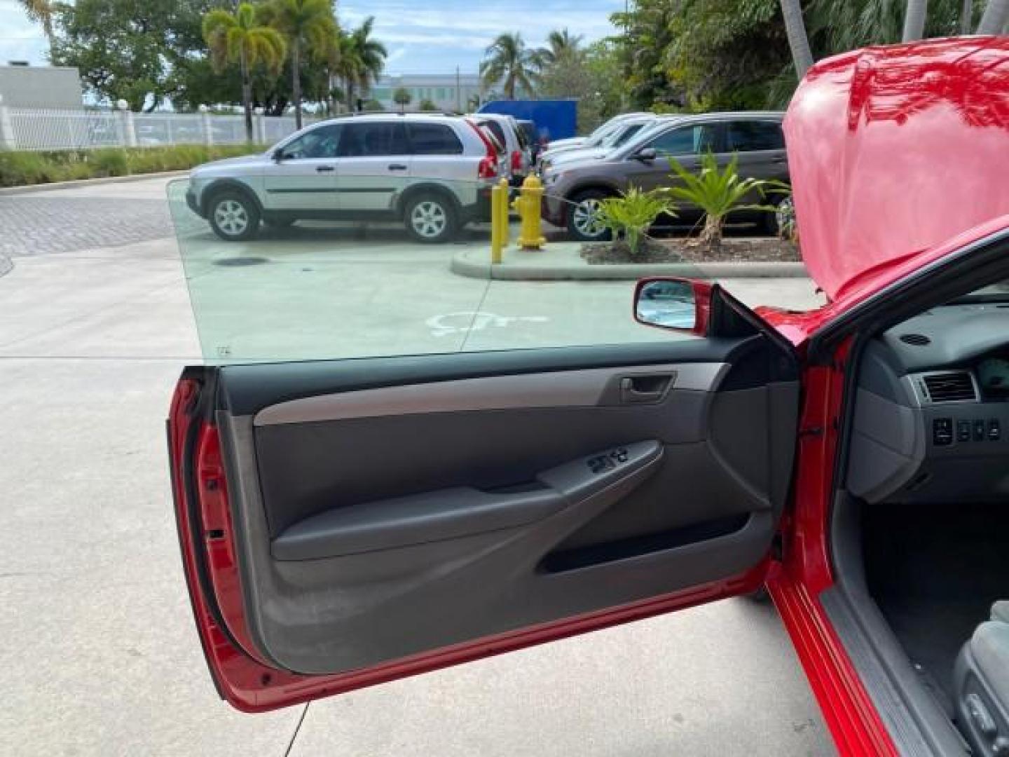2004 Absolutely Red /Dark Stone Toyota Camry Solara CONV SE 1 OWNER 74972 Mi (4T1FA38P64U) with an 3.3L DOHC SMPI VVT-i 24-Valve V6 Engine engine, Automatic transmission, located at 4701 North Dixie Hwy, Pompano Beach, FL, 33064, (954) 422-2889, 26.240938, -80.123474 - OUR WEBPAGE FLORIDACARS1.COM HAS OVER 100 PHOTOS AND FREE CARFAX LINK 2004 Toyota Camry Solara SE V6 Convertible 3.3L V6 F DOHC 24V Gasoline 29 MPG Front Wheel Drive Features ABS Brakes Air Conditioning Alloy Wheels AM/FM Stereo Automatic Transmission Cassette Player CD Audio Cloth Seats Cruise Cont- Photo#9