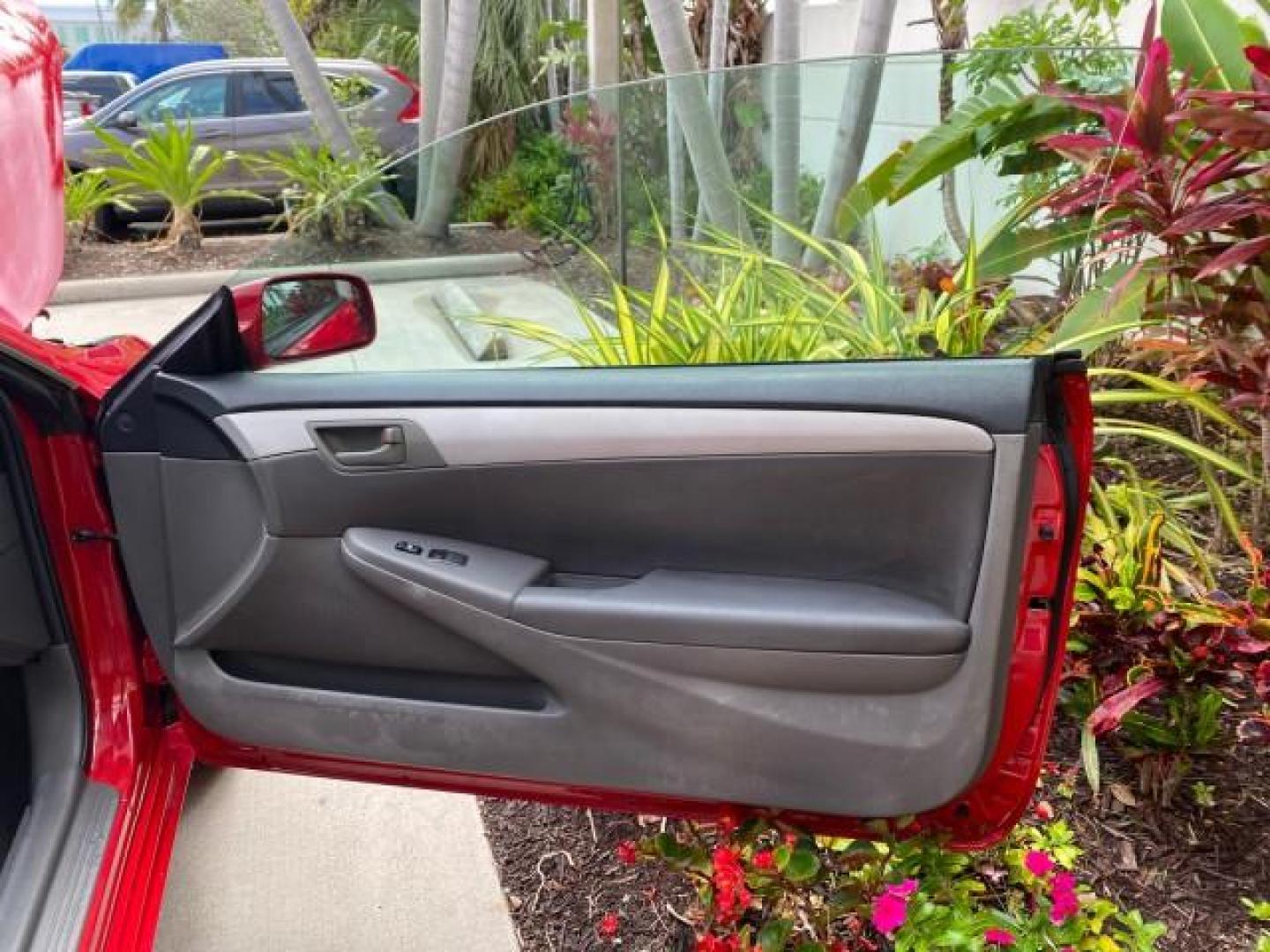 2004 Absolutely Red /Dark Stone Toyota Camry Solara CONV SE 1 OWNER 74972 Mi (4T1FA38P64U) with an 3.3L DOHC SMPI VVT-i 24-Valve V6 Engine engine, Automatic transmission, located at 4701 North Dixie Hwy, Pompano Beach, FL, 33064, (954) 422-2889, 26.240938, -80.123474 - OUR WEBPAGE FLORIDACARS1.COM HAS OVER 100 PHOTOS AND FREE CARFAX LINK 2004 Toyota Camry Solara SE V6 Convertible 3.3L V6 F DOHC 24V Gasoline 29 MPG Front Wheel Drive Features ABS Brakes Air Conditioning Alloy Wheels AM/FM Stereo Automatic Transmission Cassette Player CD Audio Cloth Seats Cruise Cont- Photo#11
