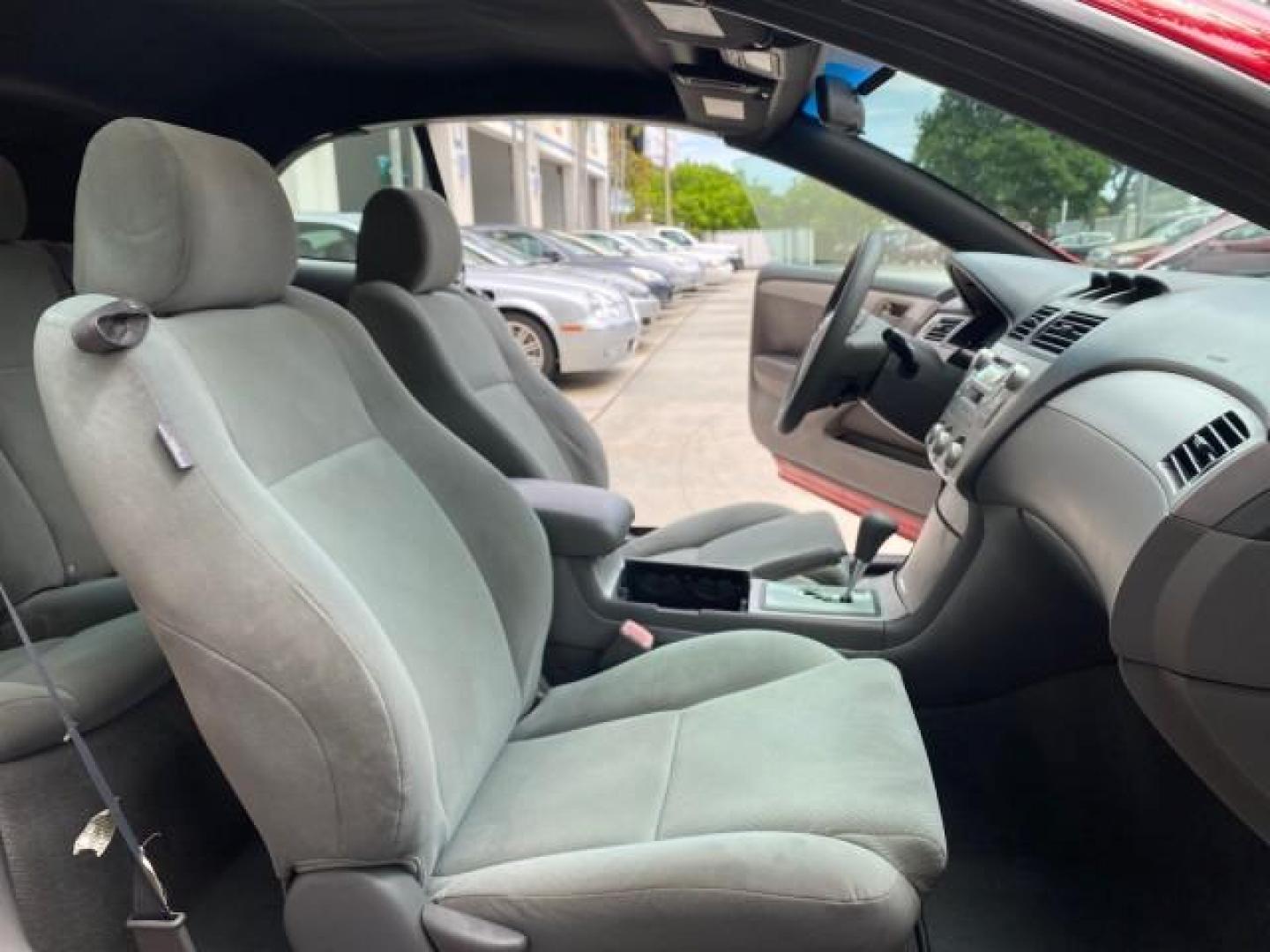 2004 Absolutely Red /Dark Stone Toyota Camry Solara CONV SE 1 OWNER 74972 Mi (4T1FA38P64U) with an 3.3L DOHC SMPI VVT-i 24-Valve V6 Engine engine, Automatic transmission, located at 4701 North Dixie Hwy, Pompano Beach, FL, 33064, (954) 422-2889, 26.240938, -80.123474 - OUR WEBPAGE FLORIDACARS1.COM HAS OVER 100 PHOTOS AND FREE CARFAX LINK 2004 Toyota Camry Solara SE V6 Convertible 3.3L V6 F DOHC 24V Gasoline 29 MPG Front Wheel Drive Features ABS Brakes Air Conditioning Alloy Wheels AM/FM Stereo Automatic Transmission Cassette Player CD Audio Cloth Seats Cruise Cont- Photo#12