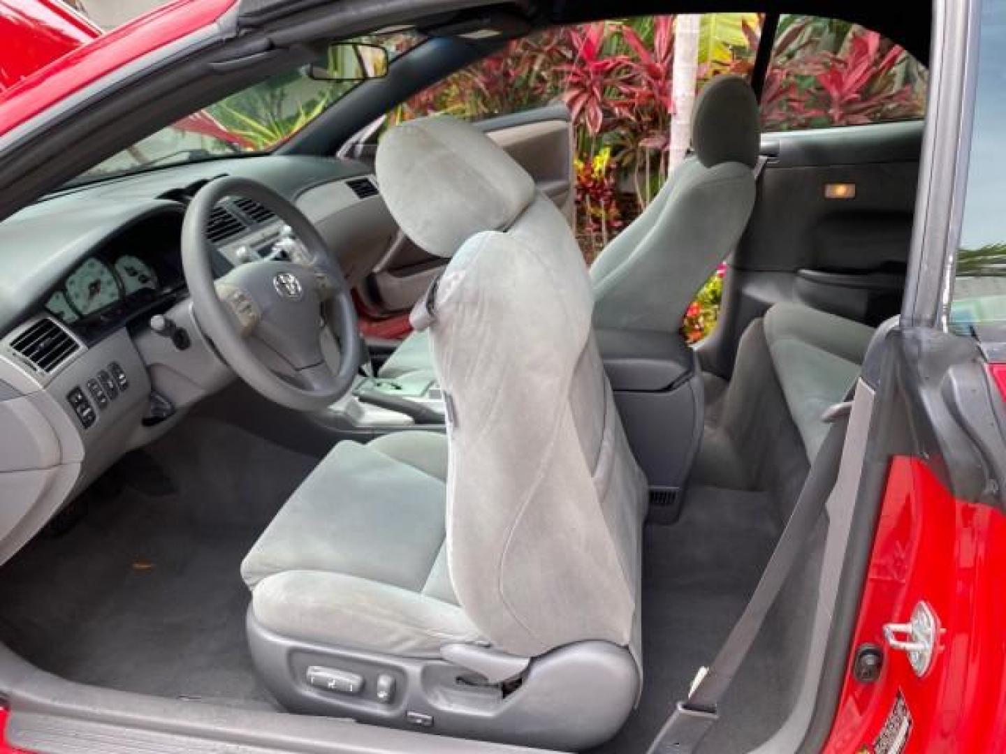 2004 Absolutely Red /Dark Stone Toyota Camry Solara CONV SE 1 OWNER 74972 Mi (4T1FA38P64U) with an 3.3L DOHC SMPI VVT-i 24-Valve V6 Engine engine, Automatic transmission, located at 4701 North Dixie Hwy, Pompano Beach, FL, 33064, (954) 422-2889, 26.240938, -80.123474 - OUR WEBPAGE FLORIDACARS1.COM HAS OVER 100 PHOTOS AND FREE CARFAX LINK 2004 Toyota Camry Solara SE V6 Convertible 3.3L V6 F DOHC 24V Gasoline 29 MPG Front Wheel Drive Features ABS Brakes Air Conditioning Alloy Wheels AM/FM Stereo Automatic Transmission Cassette Player CD Audio Cloth Seats Cruise Cont- Photo#13