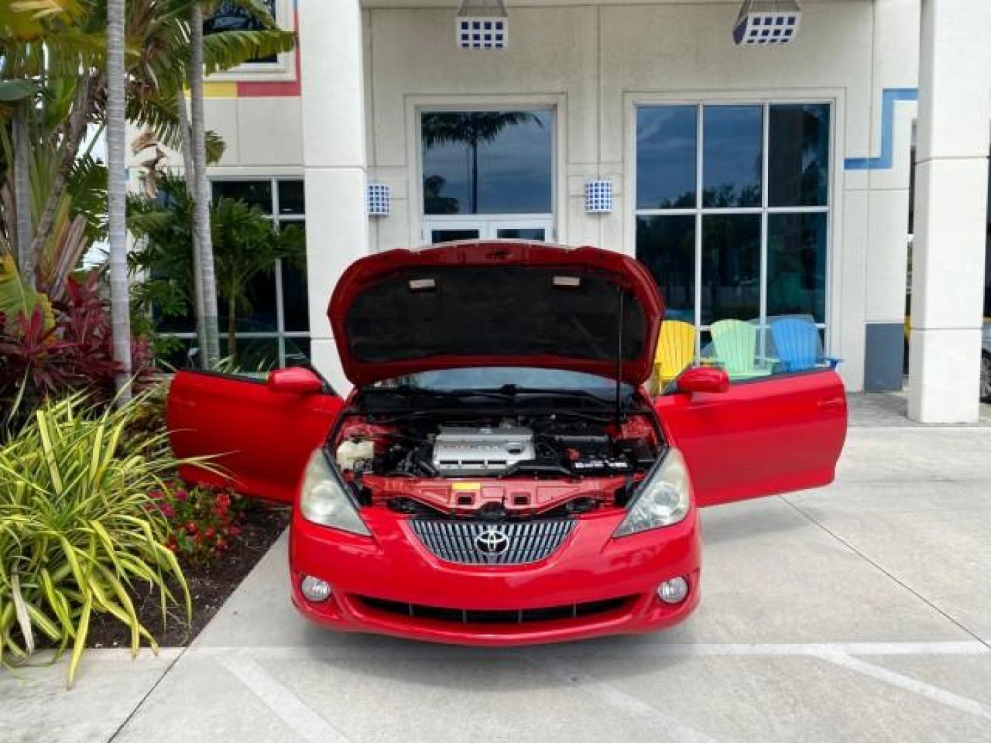 2004 Absolutely Red /Dark Stone Toyota Camry Solara CONV SE 1 OWNER 74972 Mi (4T1FA38P64U) with an 3.3L DOHC SMPI VVT-i 24-Valve V6 Engine engine, Automatic transmission, located at 4701 North Dixie Hwy, Pompano Beach, FL, 33064, (954) 422-2889, 26.240938, -80.123474 - OUR WEBPAGE FLORIDACARS1.COM HAS OVER 100 PHOTOS AND FREE CARFAX LINK 2004 Toyota Camry Solara SE V6 Convertible 3.3L V6 F DOHC 24V Gasoline 29 MPG Front Wheel Drive Features ABS Brakes Air Conditioning Alloy Wheels AM/FM Stereo Automatic Transmission Cassette Player CD Audio Cloth Seats Cruise Cont- Photo#16