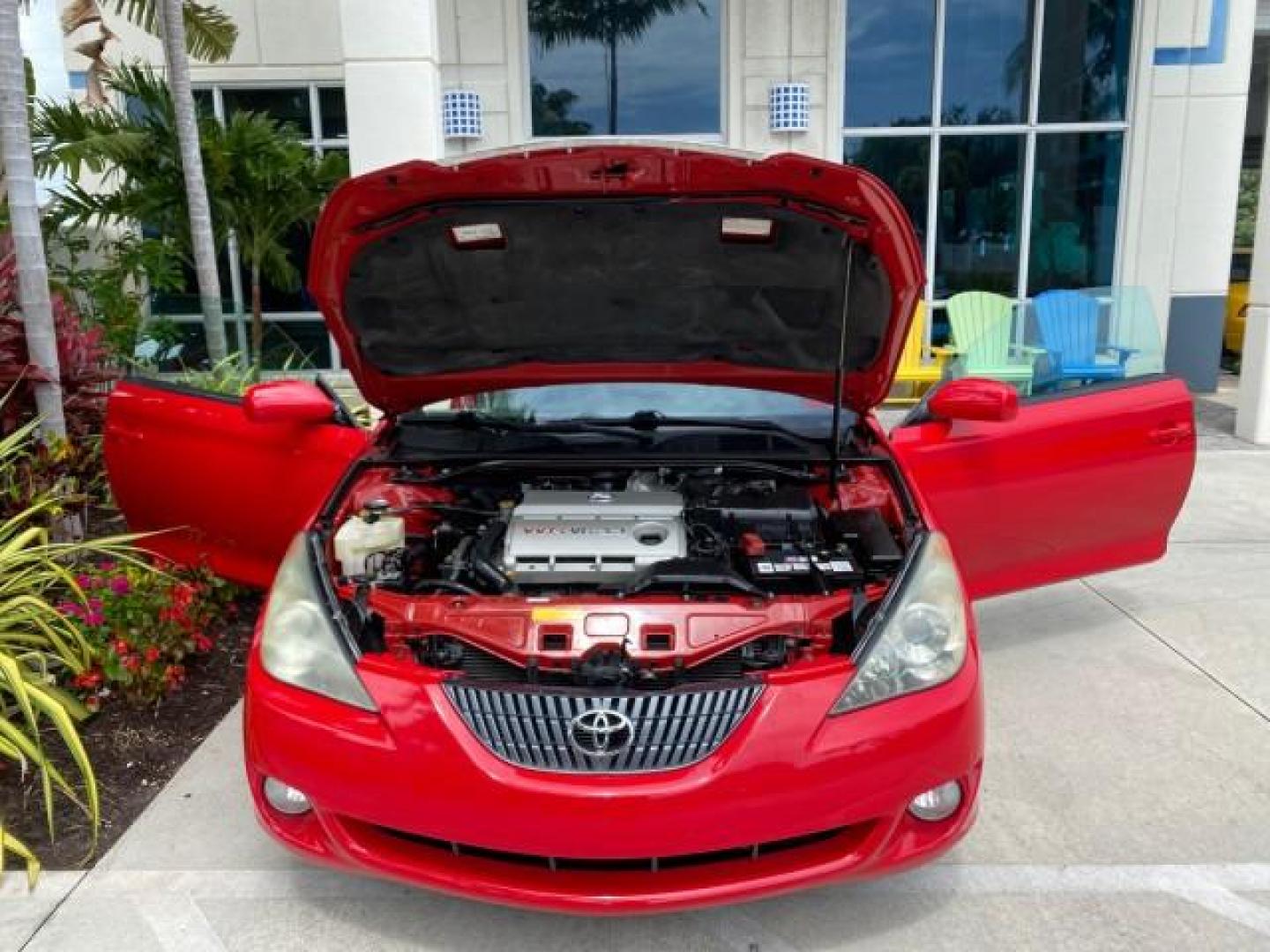 2004 Absolutely Red /Dark Stone Toyota Camry Solara CONV SE 1 OWNER 74972 Mi (4T1FA38P64U) with an 3.3L DOHC SMPI VVT-i 24-Valve V6 Engine engine, Automatic transmission, located at 4701 North Dixie Hwy, Pompano Beach, FL, 33064, (954) 422-2889, 26.240938, -80.123474 - OUR WEBPAGE FLORIDACARS1.COM HAS OVER 100 PHOTOS AND FREE CARFAX LINK 2004 Toyota Camry Solara SE V6 Convertible 3.3L V6 F DOHC 24V Gasoline 29 MPG Front Wheel Drive Features ABS Brakes Air Conditioning Alloy Wheels AM/FM Stereo Automatic Transmission Cassette Player CD Audio Cloth Seats Cruise Cont- Photo#17