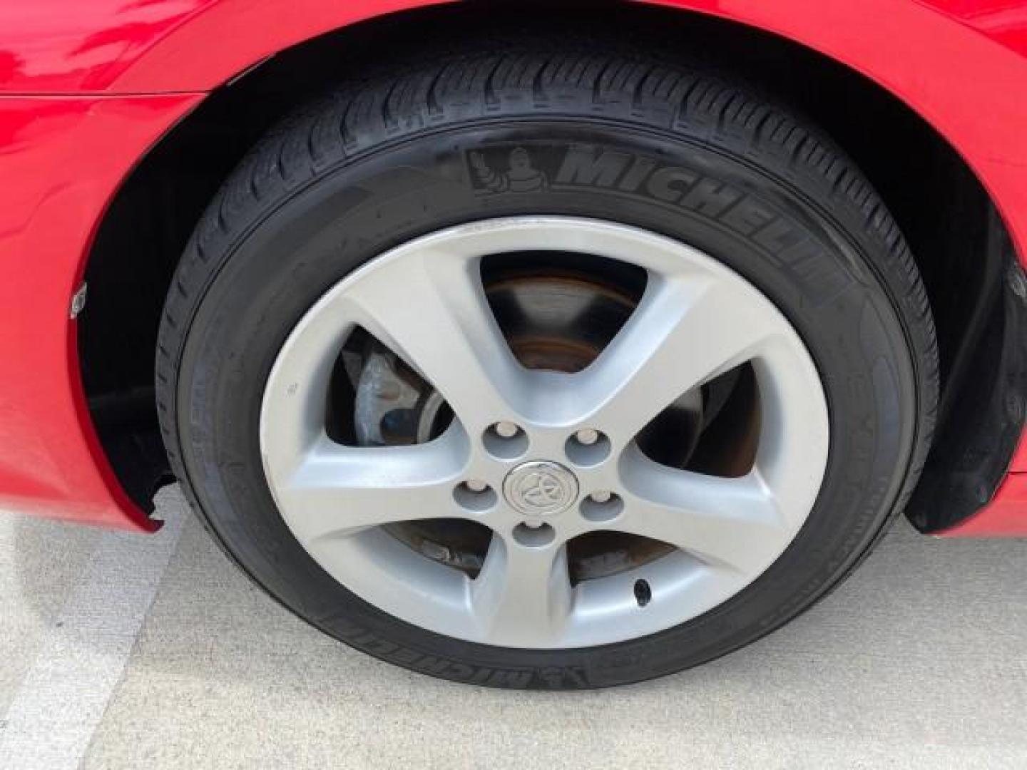 2004 Absolutely Red /Dark Stone Toyota Camry Solara CONV SE 1 OWNER 74972 Mi (4T1FA38P64U) with an 3.3L DOHC SMPI VVT-i 24-Valve V6 Engine engine, Automatic transmission, located at 4701 North Dixie Hwy, Pompano Beach, FL, 33064, (954) 422-2889, 26.240938, -80.123474 - OUR WEBPAGE FLORIDACARS1.COM HAS OVER 100 PHOTOS AND FREE CARFAX LINK 2004 Toyota Camry Solara SE V6 Convertible 3.3L V6 F DOHC 24V Gasoline 29 MPG Front Wheel Drive Features ABS Brakes Air Conditioning Alloy Wheels AM/FM Stereo Automatic Transmission Cassette Player CD Audio Cloth Seats Cruise Cont- Photo#19