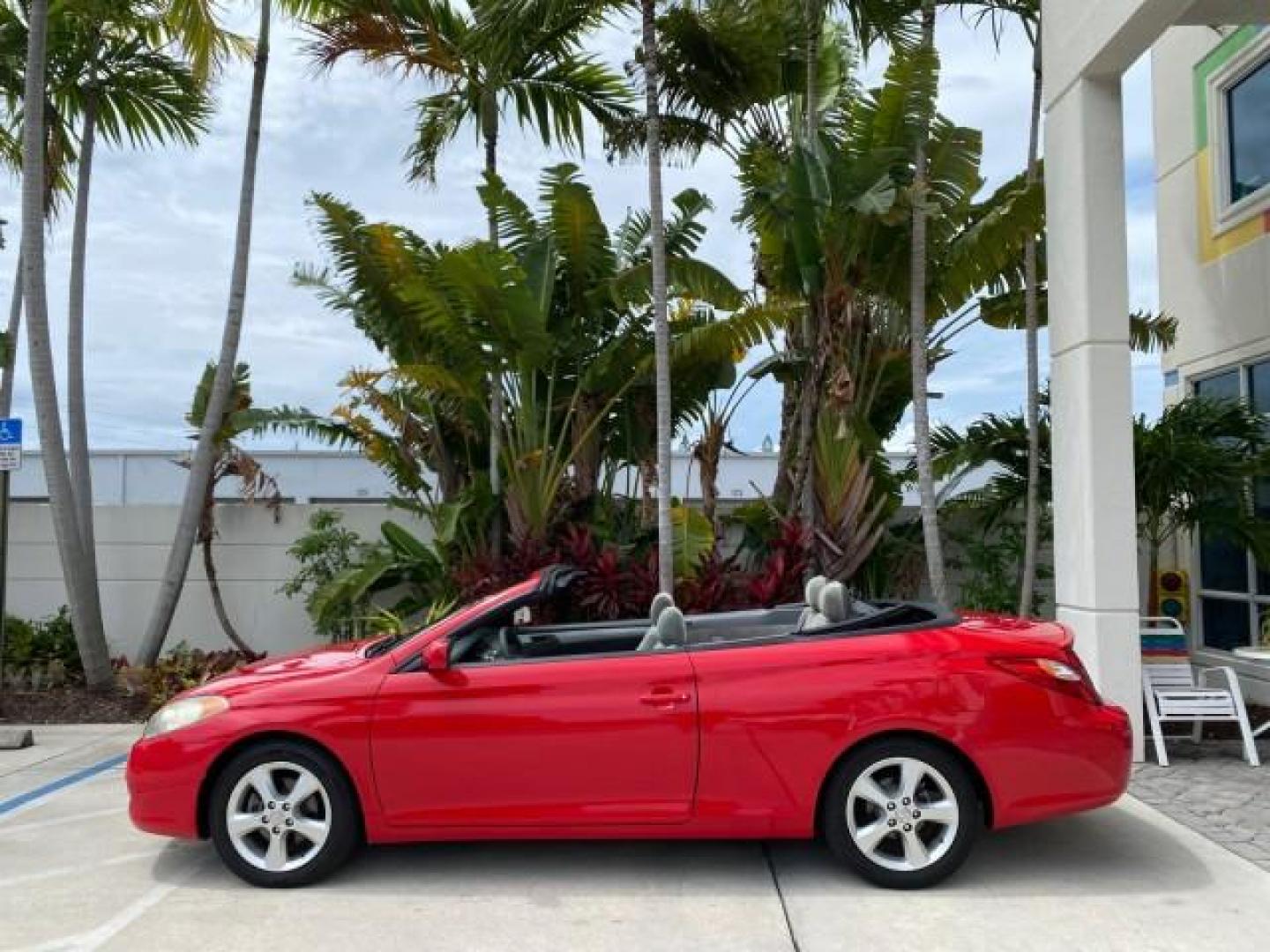 2004 Absolutely Red /Dark Stone Toyota Camry Solara CONV SE 1 OWNER 74972 Mi (4T1FA38P64U) with an 3.3L DOHC SMPI VVT-i 24-Valve V6 Engine engine, Automatic transmission, located at 4701 North Dixie Hwy, Pompano Beach, FL, 33064, (954) 422-2889, 26.240938, -80.123474 - OUR WEBPAGE FLORIDACARS1.COM HAS OVER 100 PHOTOS AND FREE CARFAX LINK 2004 Toyota Camry Solara SE V6 Convertible 3.3L V6 F DOHC 24V Gasoline 29 MPG Front Wheel Drive Features ABS Brakes Air Conditioning Alloy Wheels AM/FM Stereo Automatic Transmission Cassette Player CD Audio Cloth Seats Cruise Cont- Photo#35