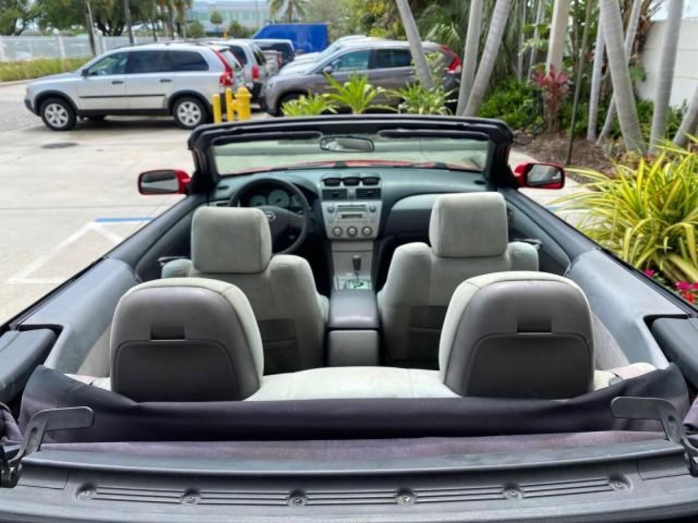 2004 Absolutely Red /Dark Stone Toyota Camry Solara CONV SE 1 OWNER 74972 Mi (4T1FA38P64U) with an 3.3L DOHC SMPI VVT-i 24-Valve V6 Engine engine, Automatic transmission, located at 4701 North Dixie Hwy, Pompano Beach, FL, 33064, (954) 422-2889, 26.240938, -80.123474 - OUR WEBPAGE FLORIDACARS1.COM HAS OVER 100 PHOTOS AND FREE CARFAX LINK 2004 Toyota Camry Solara SE V6 Convertible 3.3L V6 F DOHC 24V Gasoline 29 MPG Front Wheel Drive Features ABS Brakes Air Conditioning Alloy Wheels AM/FM Stereo Automatic Transmission Cassette Player CD Audio Cloth Seats Cruise Cont- Photo#46
