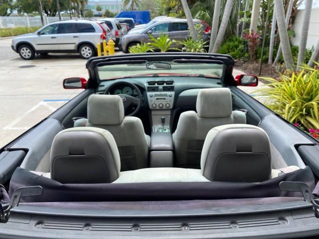 2004 Absolutely Red /Dark Stone Toyota Camry Solara CONV SE 1 OWNER 74972 Mi (4T1FA38P64U) with an 3.3L DOHC SMPI VVT-i 24-Valve V6 Engine engine, Automatic transmission, located at 4701 North Dixie Hwy, Pompano Beach, FL, 33064, (954) 422-2889, 26.240938, -80.123474 - OUR WEBPAGE FLORIDACARS1.COM HAS OVER 100 PHOTOS AND FREE CARFAX LINK 2004 Toyota Camry Solara SE V6 Convertible 3.3L V6 F DOHC 24V Gasoline 29 MPG Front Wheel Drive Features ABS Brakes Air Conditioning Alloy Wheels AM/FM Stereo Automatic Transmission Cassette Player CD Audio Cloth Seats Cruise Cont - Photo#46