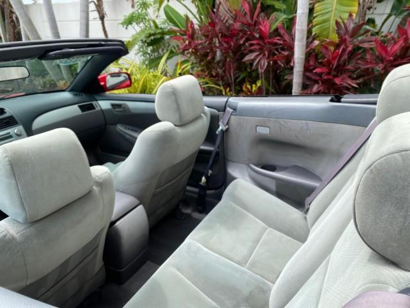 2004 Absolutely Red /Dark Stone Toyota Camry Solara CONV SE 1 OWNER 74972 Mi (4T1FA38P64U) with an 3.3L DOHC SMPI VVT-i 24-Valve V6 Engine engine, Automatic transmission, located at 4701 North Dixie Hwy, Pompano Beach, FL, 33064, (954) 422-2889, 26.240938, -80.123474 - OUR WEBPAGE FLORIDACARS1.COM HAS OVER 100 PHOTOS AND FREE CARFAX LINK 2004 Toyota Camry Solara SE V6 Convertible 3.3L V6 F DOHC 24V Gasoline 29 MPG Front Wheel Drive Features ABS Brakes Air Conditioning Alloy Wheels AM/FM Stereo Automatic Transmission Cassette Player CD Audio Cloth Seats Cruise Cont- Photo#47