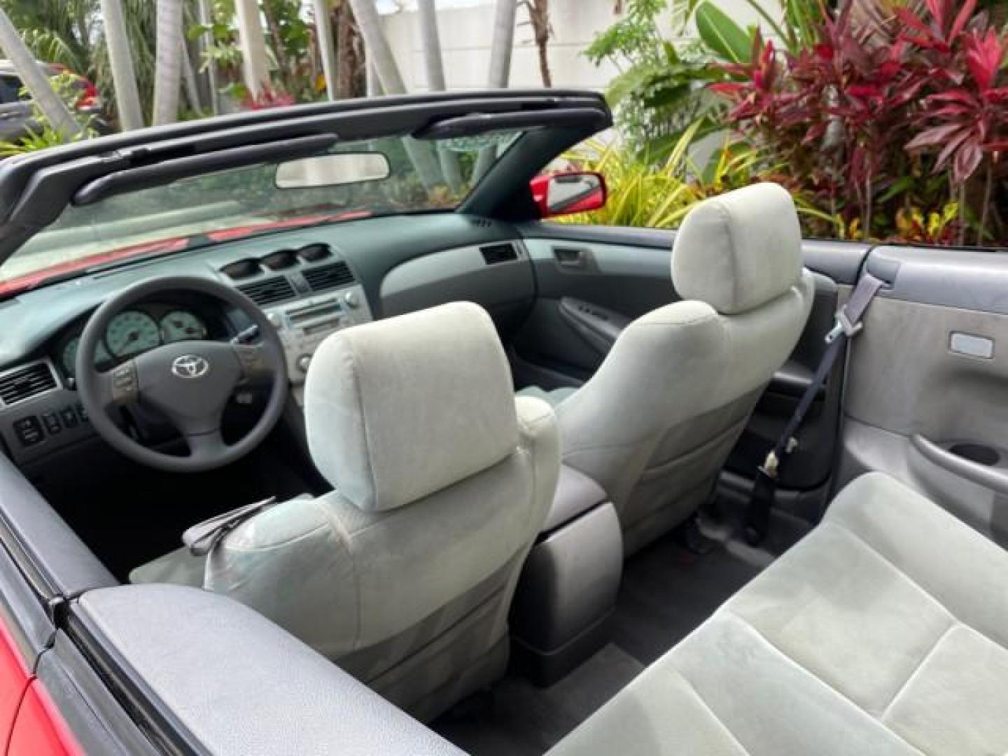 2004 Absolutely Red /Dark Stone Toyota Camry Solara CONV SE 1 OWNER 74972 Mi (4T1FA38P64U) with an 3.3L DOHC SMPI VVT-i 24-Valve V6 Engine engine, Automatic transmission, located at 4701 North Dixie Hwy, Pompano Beach, FL, 33064, (954) 422-2889, 26.240938, -80.123474 - OUR WEBPAGE FLORIDACARS1.COM HAS OVER 100 PHOTOS AND FREE CARFAX LINK 2004 Toyota Camry Solara SE V6 Convertible 3.3L V6 F DOHC 24V Gasoline 29 MPG Front Wheel Drive Features ABS Brakes Air Conditioning Alloy Wheels AM/FM Stereo Automatic Transmission Cassette Player CD Audio Cloth Seats Cruise Cont- Photo#48