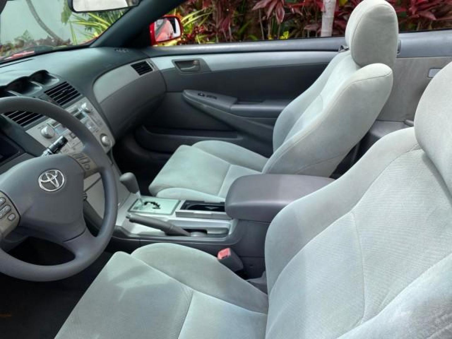 2004 Absolutely Red /Dark Stone Toyota Camry Solara CONV SE 1 OWNER 74972 Mi (4T1FA38P64U) with an 3.3L DOHC SMPI VVT-i 24-Valve V6 Engine engine, Automatic transmission, located at 4701 North Dixie Hwy, Pompano Beach, FL, 33064, (954) 422-2889, 26.240938, -80.123474 - OUR WEBPAGE FLORIDACARS1.COM HAS OVER 100 PHOTOS AND FREE CARFAX LINK 2004 Toyota Camry Solara SE V6 Convertible 3.3L V6 F DOHC 24V Gasoline 29 MPG Front Wheel Drive Features ABS Brakes Air Conditioning Alloy Wheels AM/FM Stereo Automatic Transmission Cassette Player CD Audio Cloth Seats Cruise Cont- Photo#50