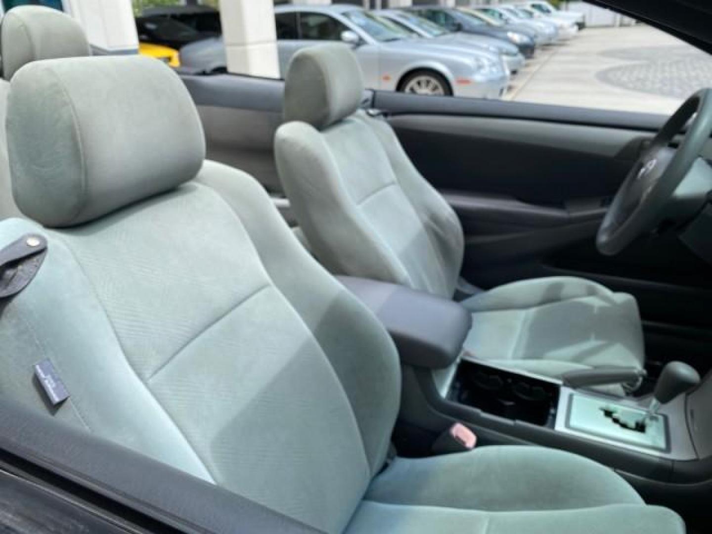 2004 Absolutely Red /Dark Stone Toyota Camry Solara CONV SE 1 OWNER 74972 Mi (4T1FA38P64U) with an 3.3L DOHC SMPI VVT-i 24-Valve V6 Engine engine, Automatic transmission, located at 4701 North Dixie Hwy, Pompano Beach, FL, 33064, (954) 422-2889, 26.240938, -80.123474 - OUR WEBPAGE FLORIDACARS1.COM HAS OVER 100 PHOTOS AND FREE CARFAX LINK 2004 Toyota Camry Solara SE V6 Convertible 3.3L V6 F DOHC 24V Gasoline 29 MPG Front Wheel Drive Features ABS Brakes Air Conditioning Alloy Wheels AM/FM Stereo Automatic Transmission Cassette Player CD Audio Cloth Seats Cruise Cont- Photo#52